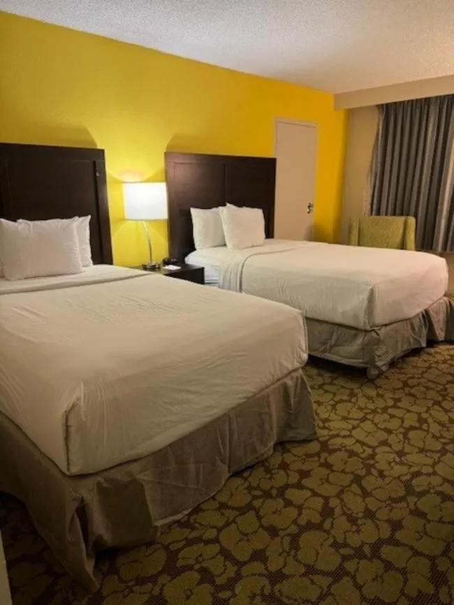 Photo of the whole room in Ramada Plaza by Wyndham Charlotte South End Airport