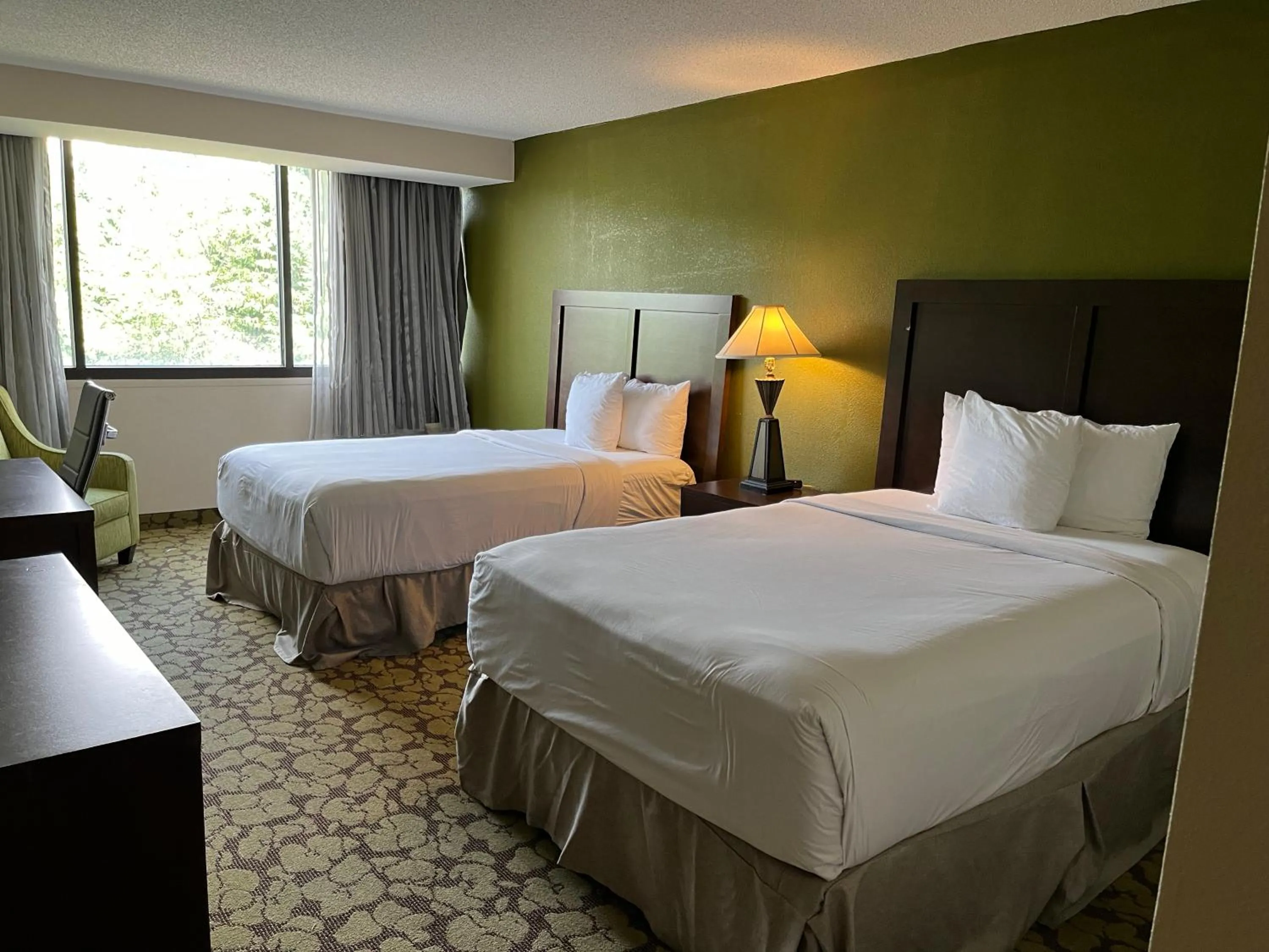 Photo of the whole room in Ramada Plaza by Wyndham Charlotte South End Airport