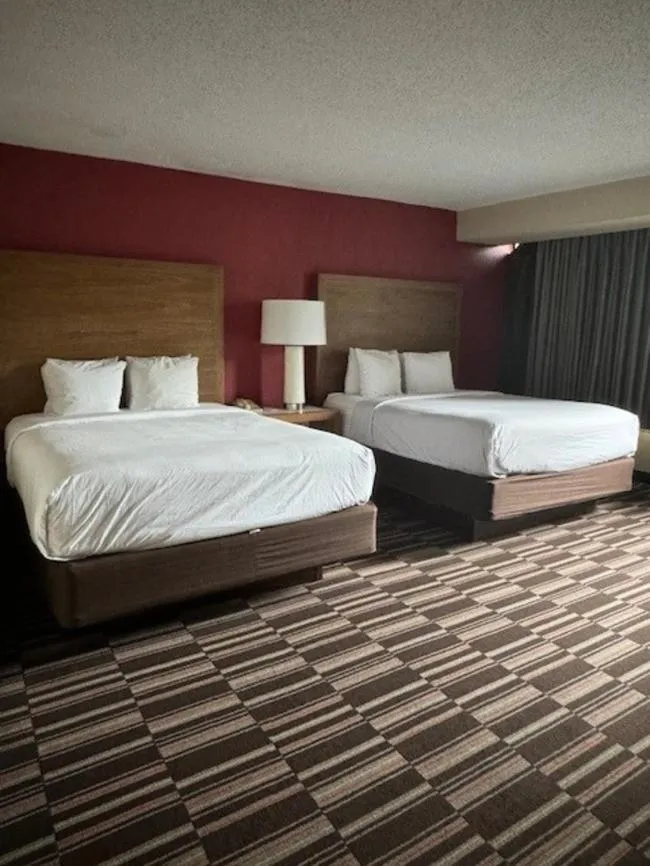 Photo of the whole room in Ramada Plaza by Wyndham Charlotte South End Airport