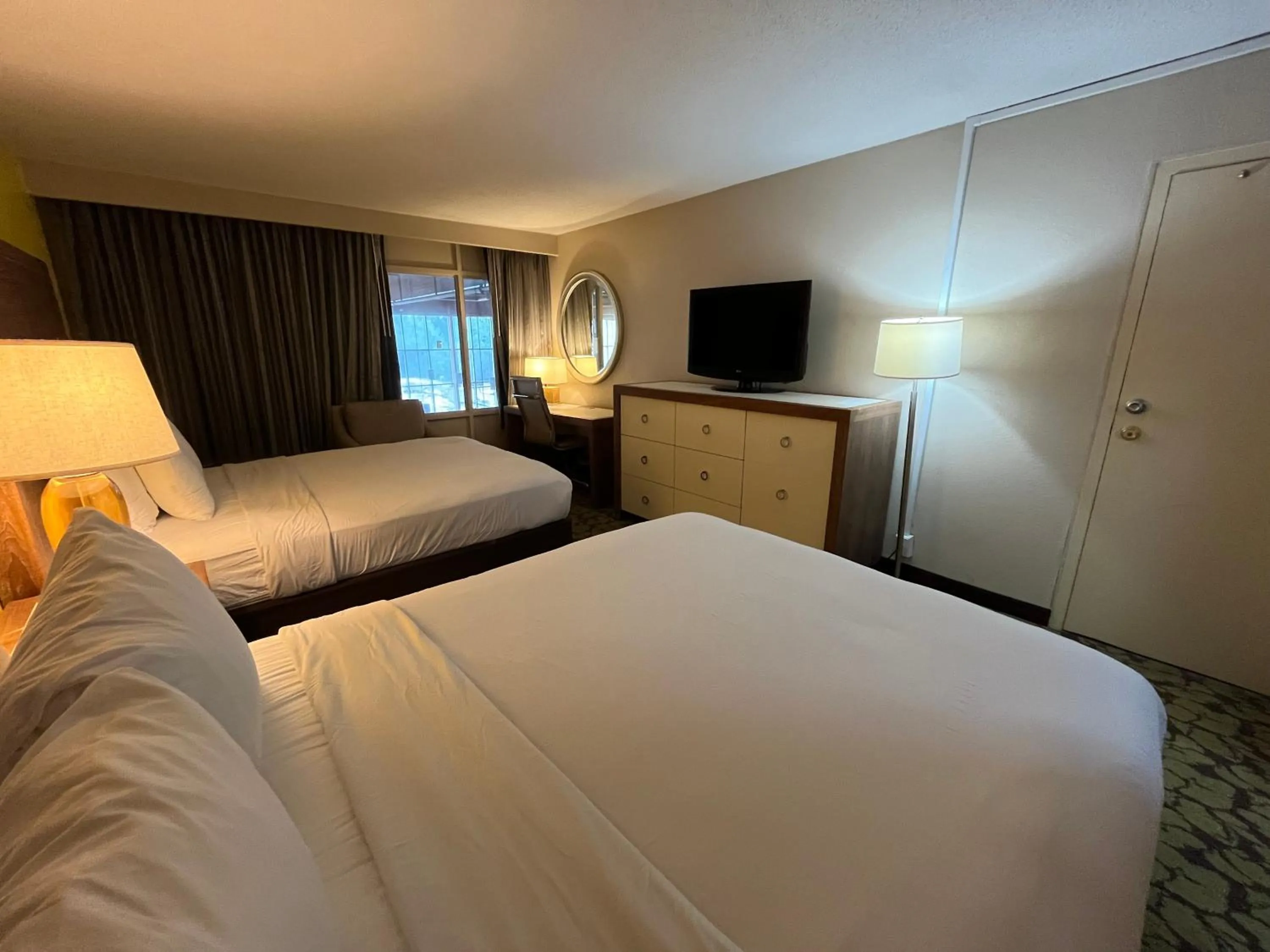 Photo of the whole room in Ramada Plaza by Wyndham Charlotte South End Airport