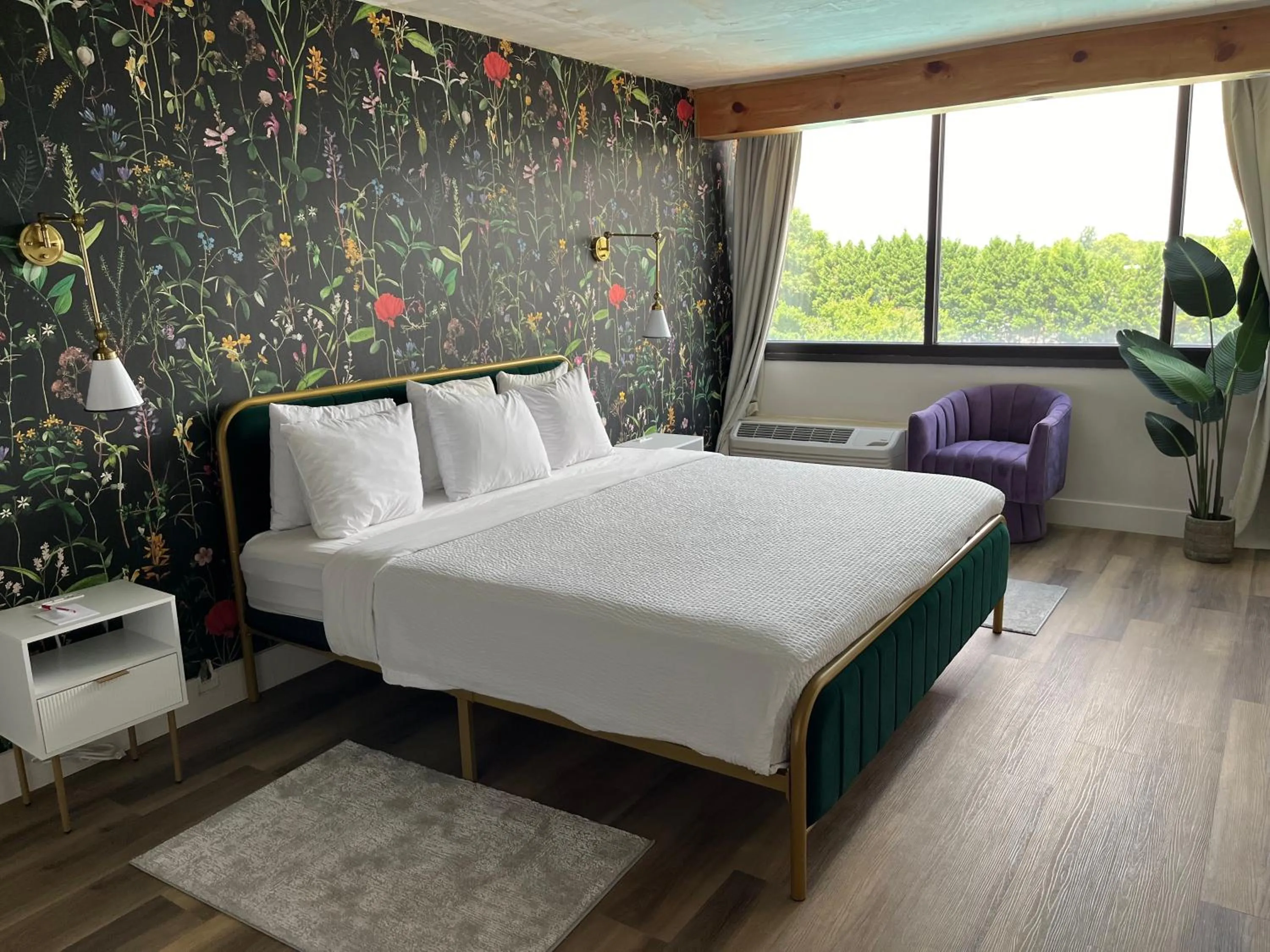 Photo of the whole room in Ramada Plaza by Wyndham Charlotte South End Airport