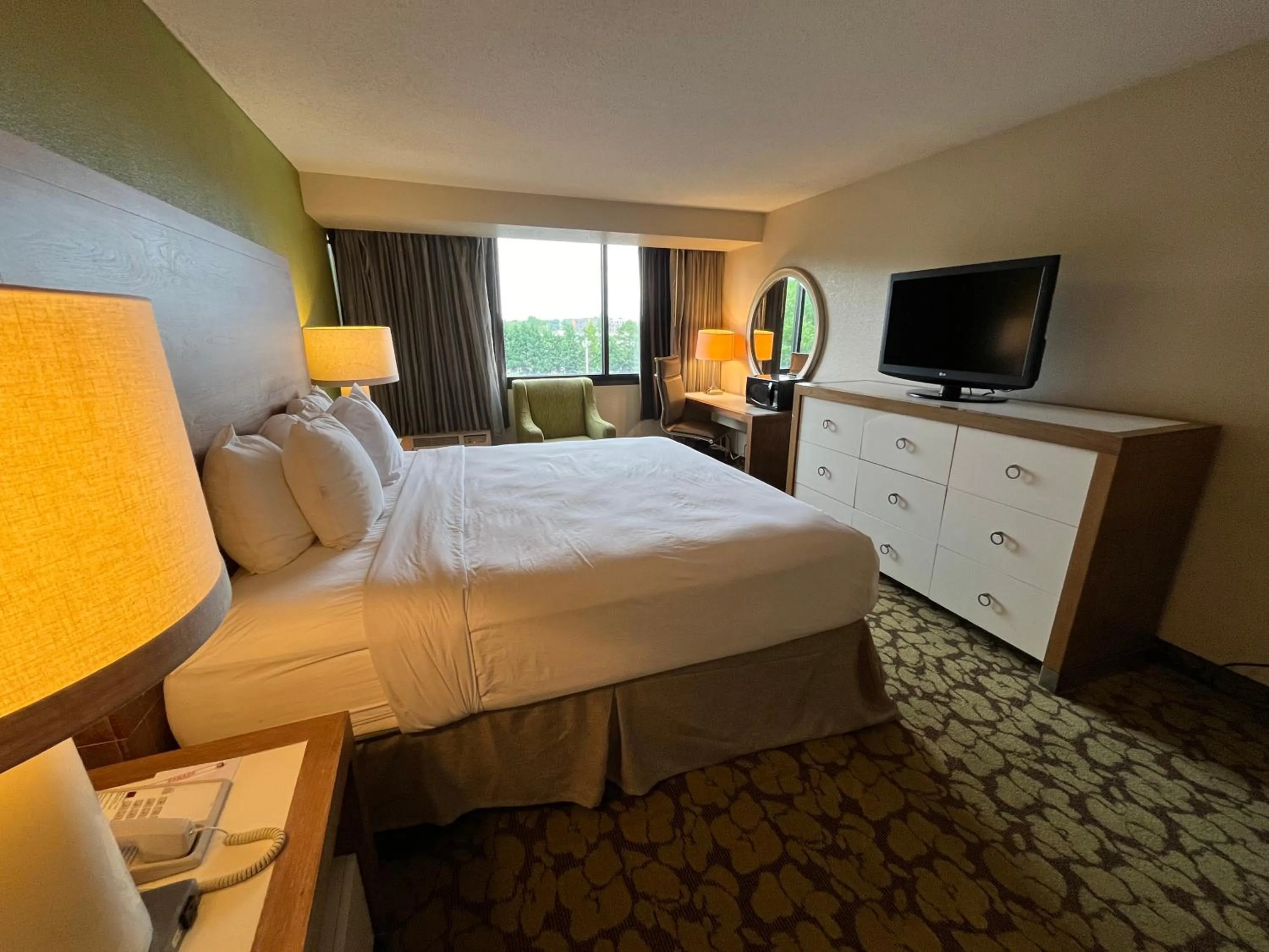 Photo of the whole room in Ramada Plaza by Wyndham Charlotte South End Airport