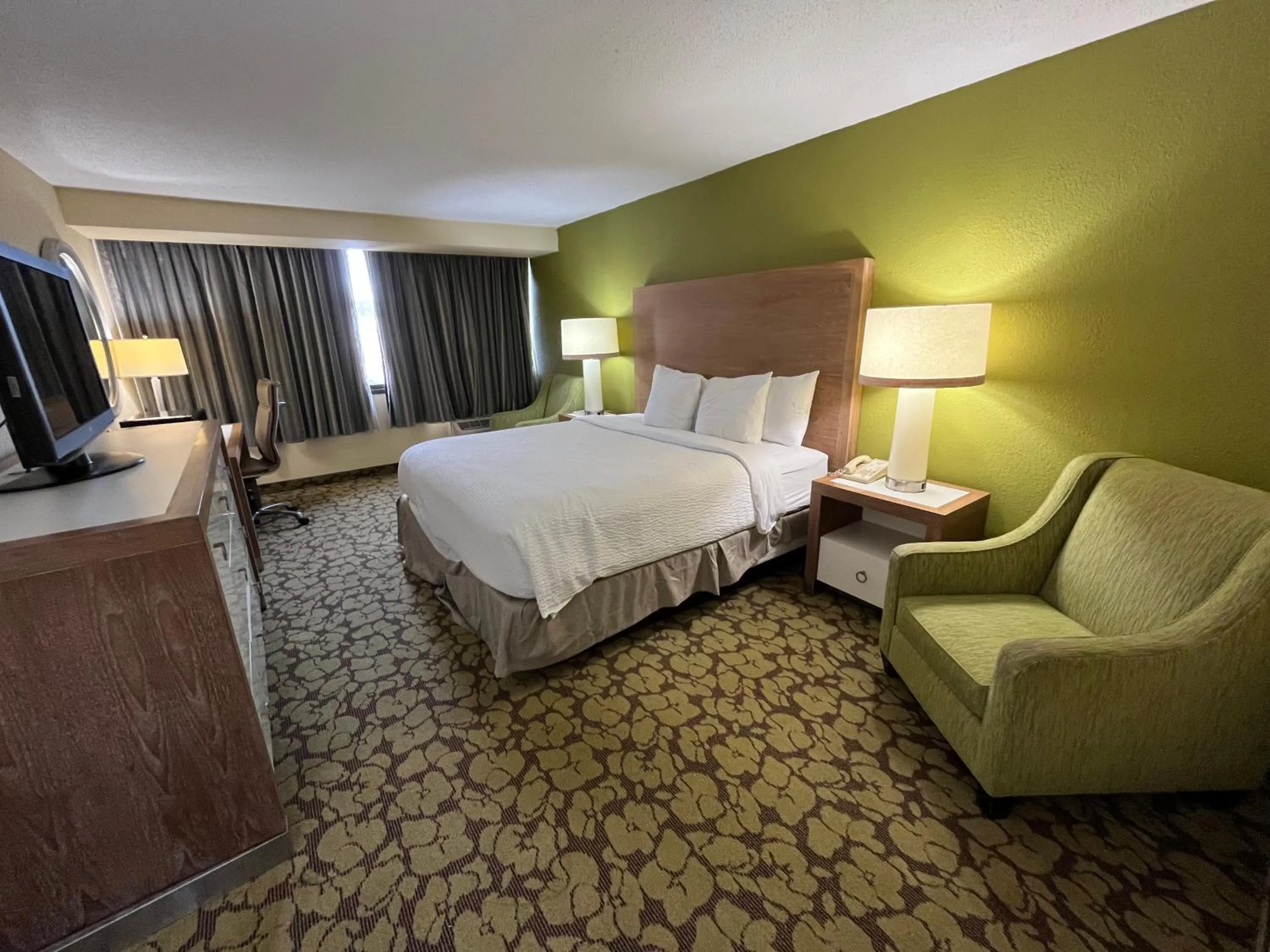 Photo of the whole room in Ramada Plaza by Wyndham Charlotte South End Airport