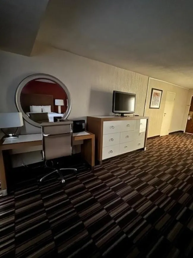 Photo of the whole room in Ramada Plaza by Wyndham Charlotte South End Airport