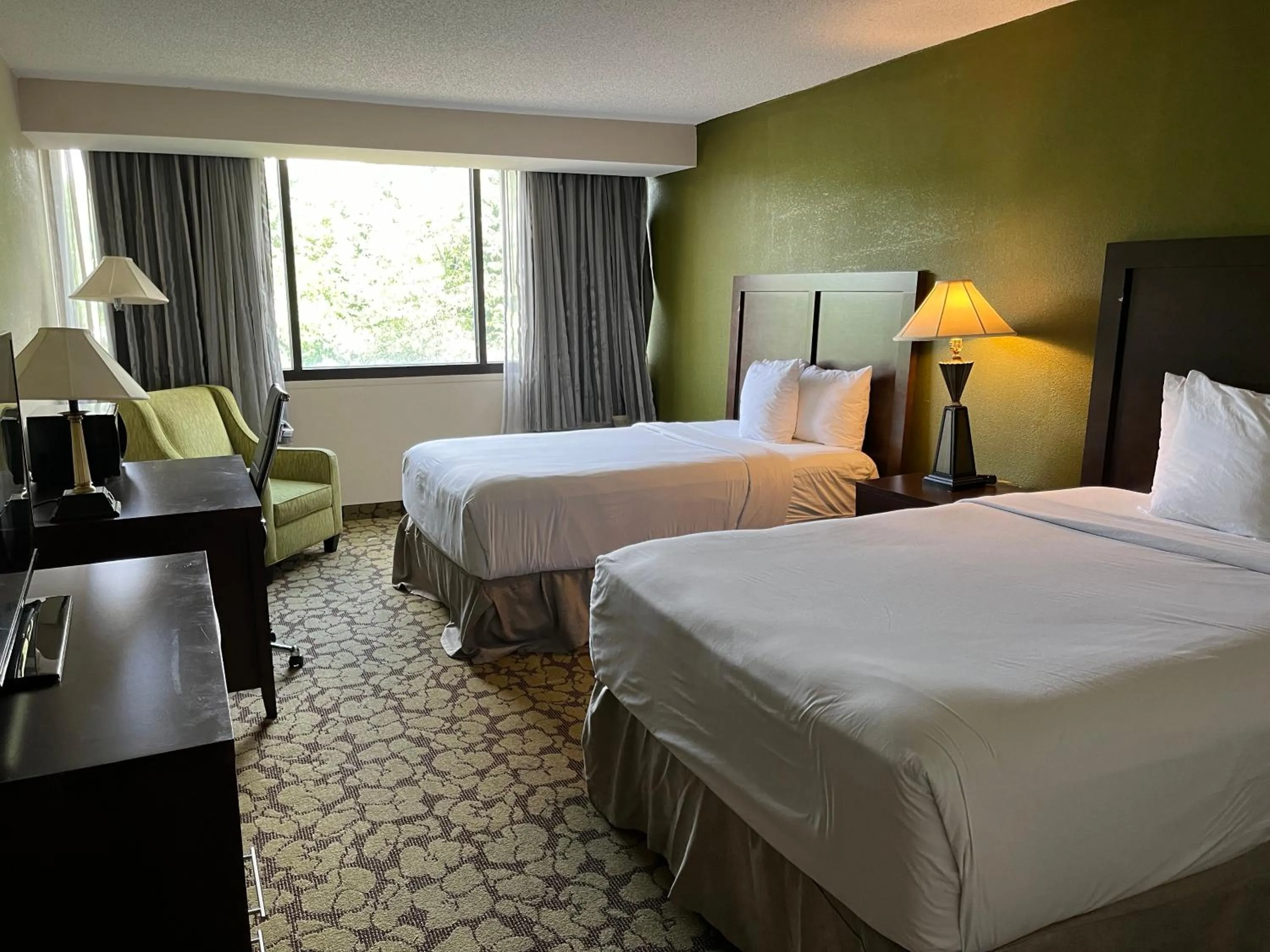 Photo of the whole room in Ramada Plaza by Wyndham Charlotte South End Airport