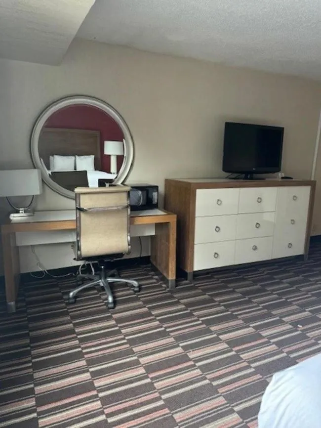 Photo of the whole room in Ramada Plaza by Wyndham Charlotte South End Airport