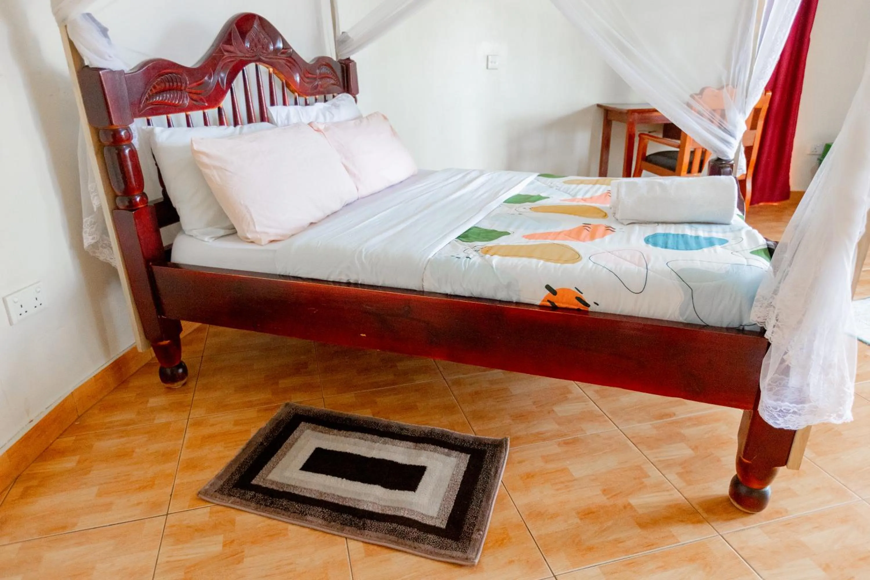 Bed in Acacia Villa Kampala