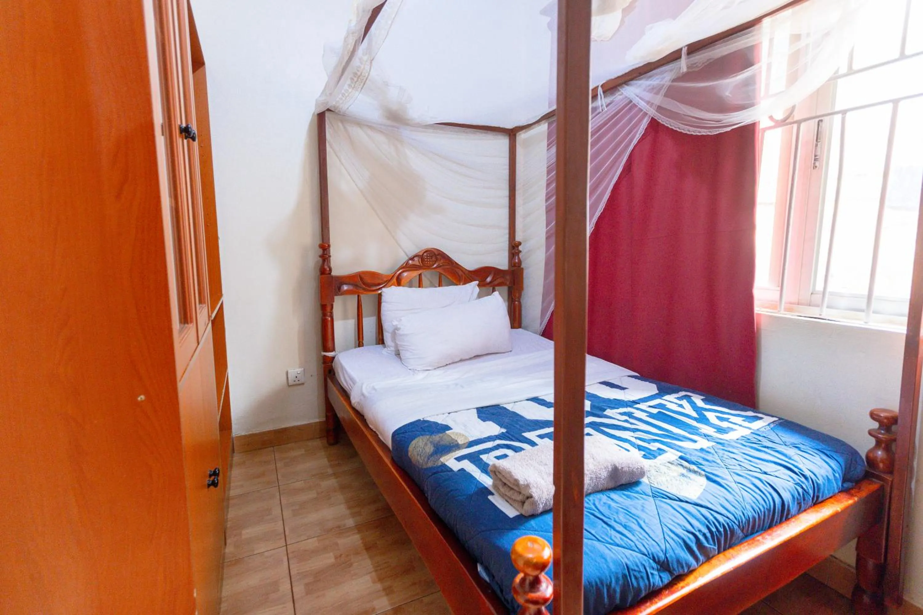 Bed in Acacia Villa Kampala