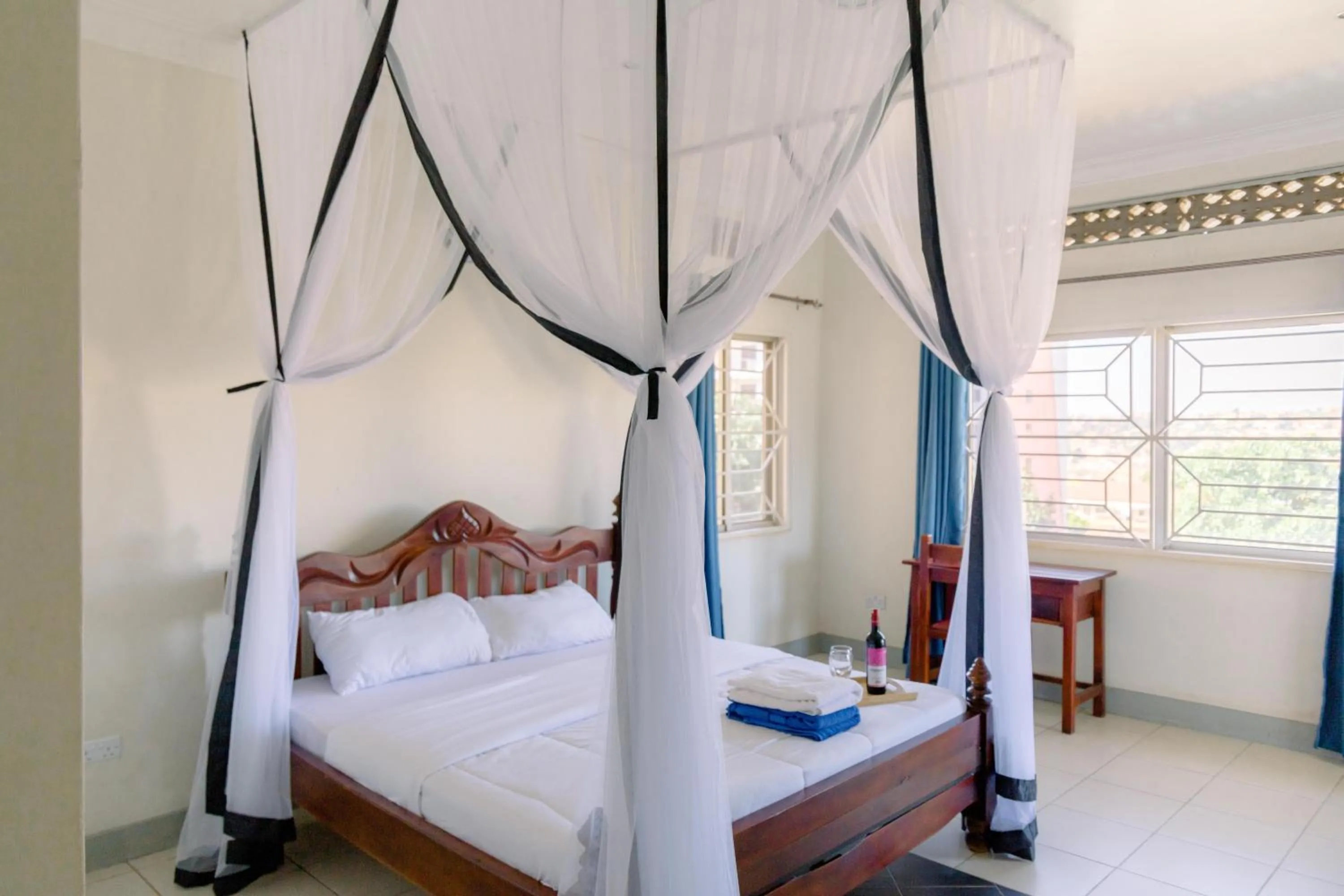 Bed in Acacia Villa Kampala