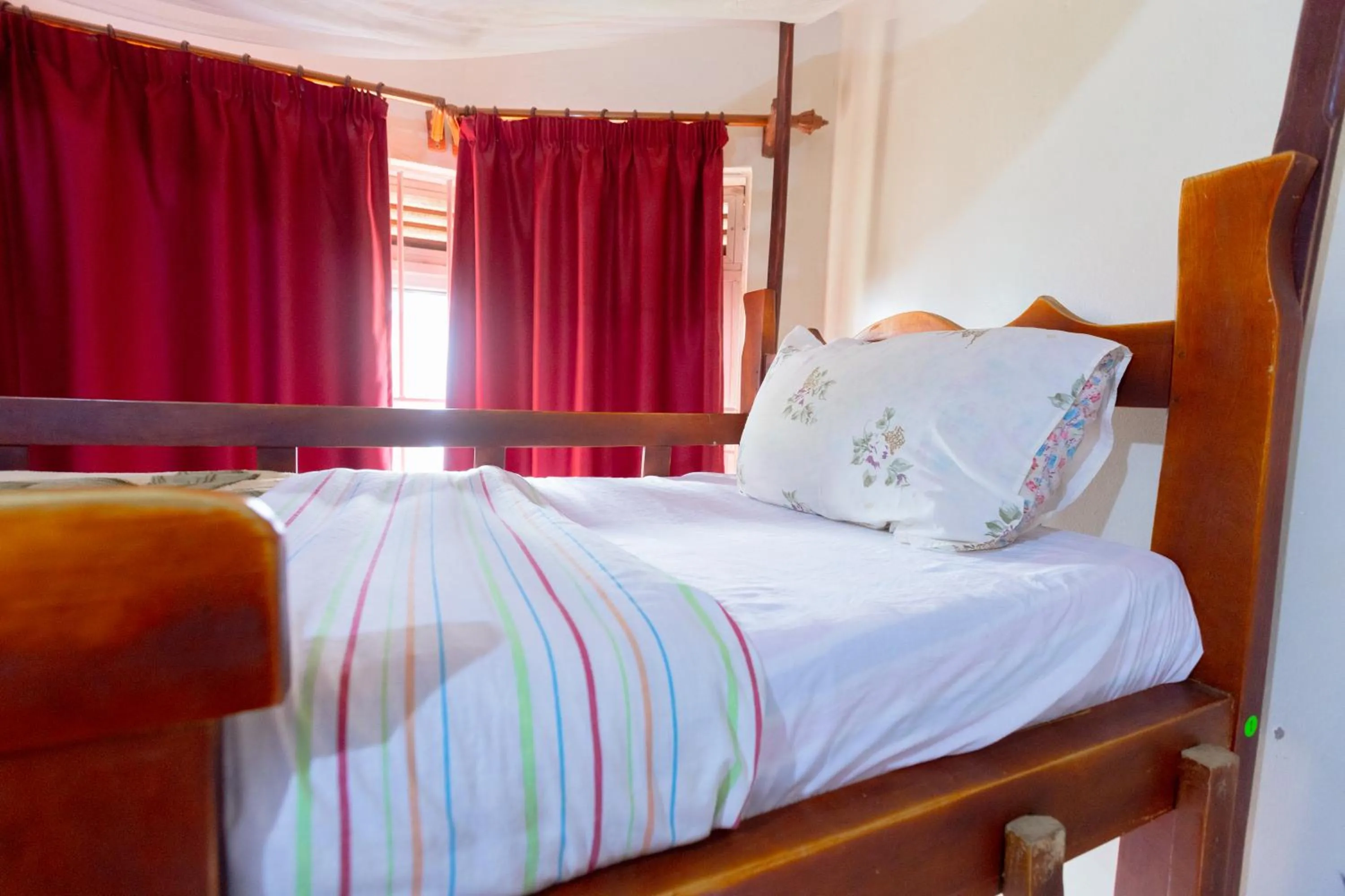Bed in Acacia Villa Kampala
