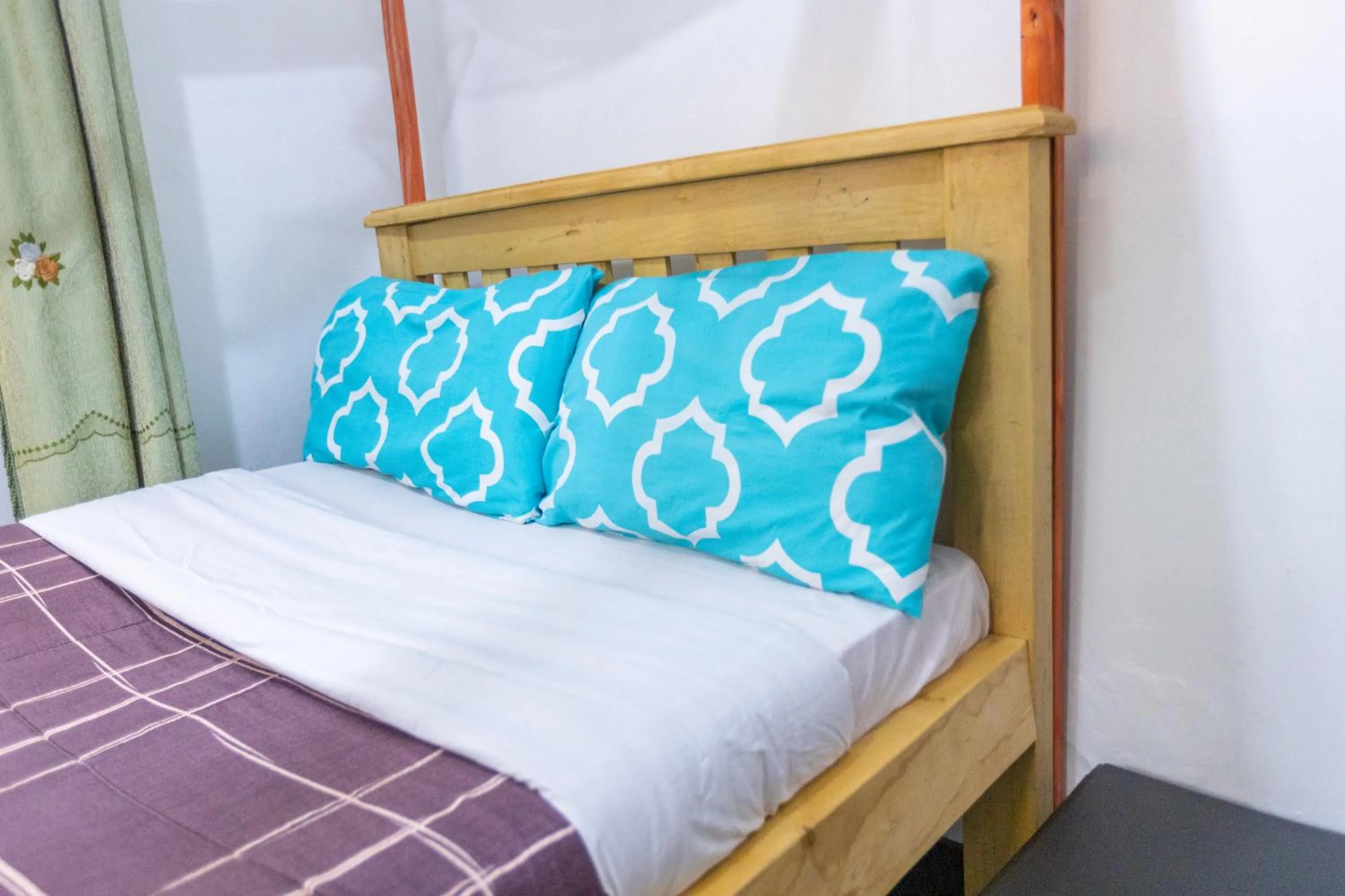 Bed in Acacia Villa Kampala