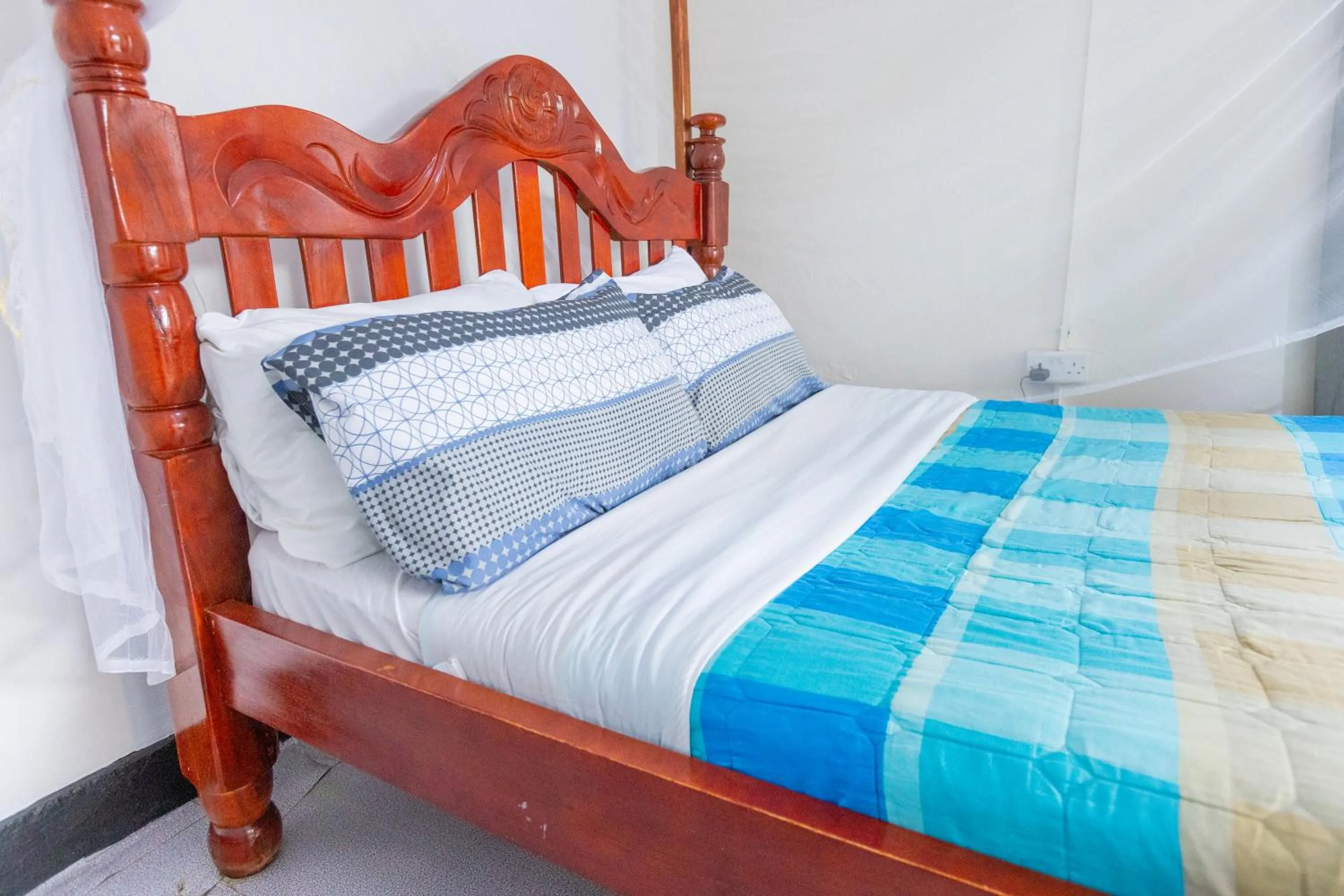 Bed in Acacia Villa Kampala