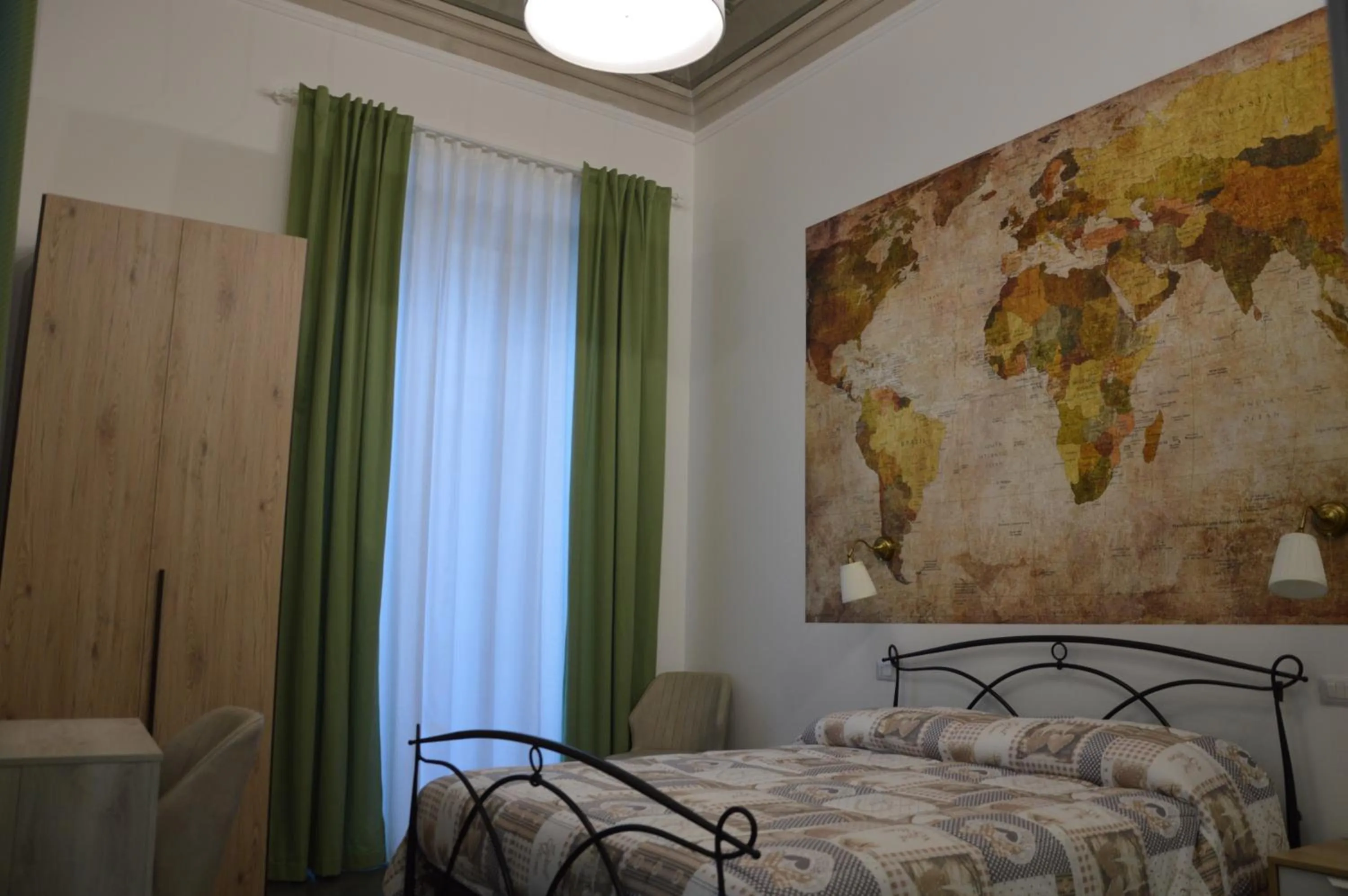 Photo of the whole room, Bed in B&B Giardino Bellini-centro