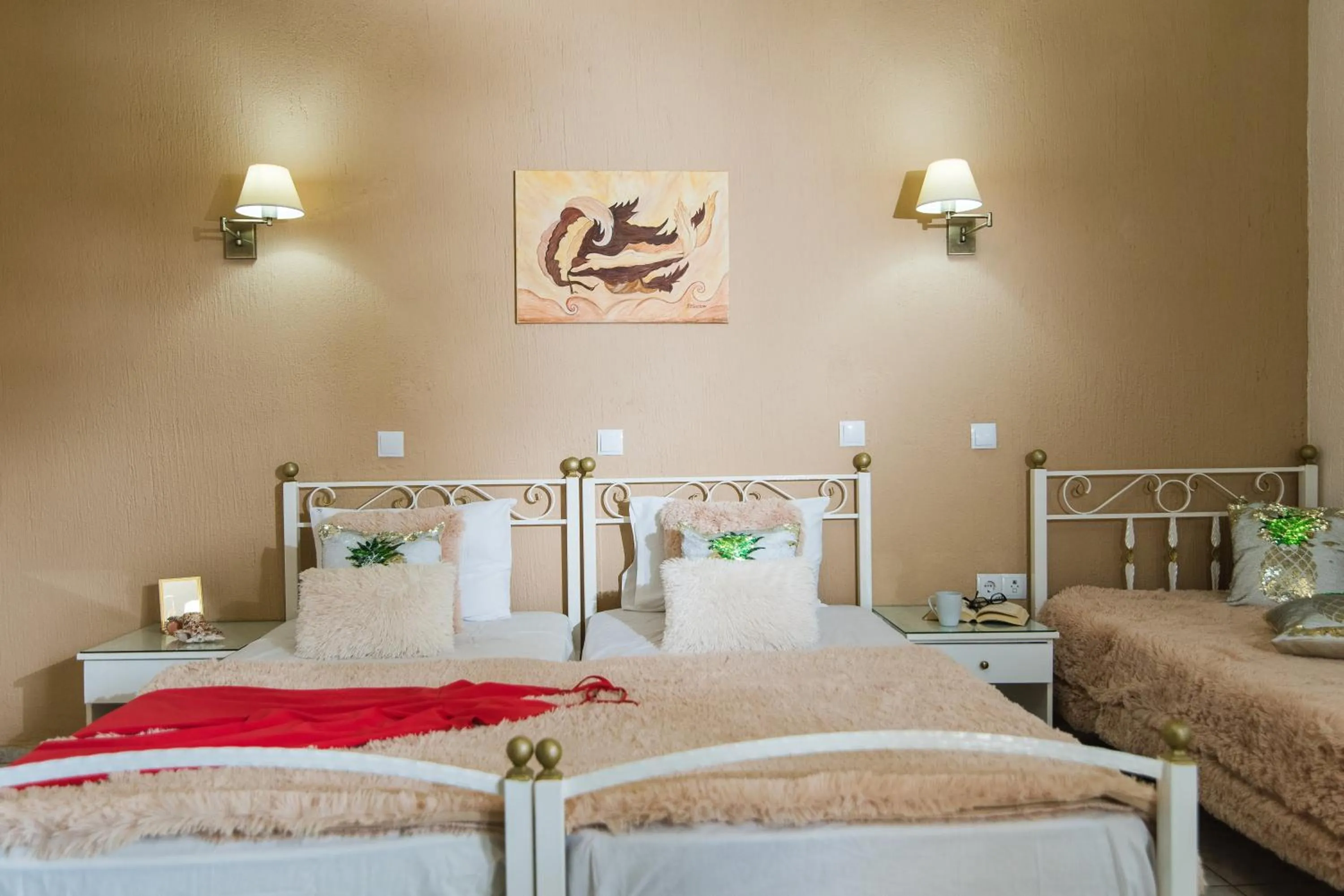 Photo of the whole room, Bed in Oasis Studios