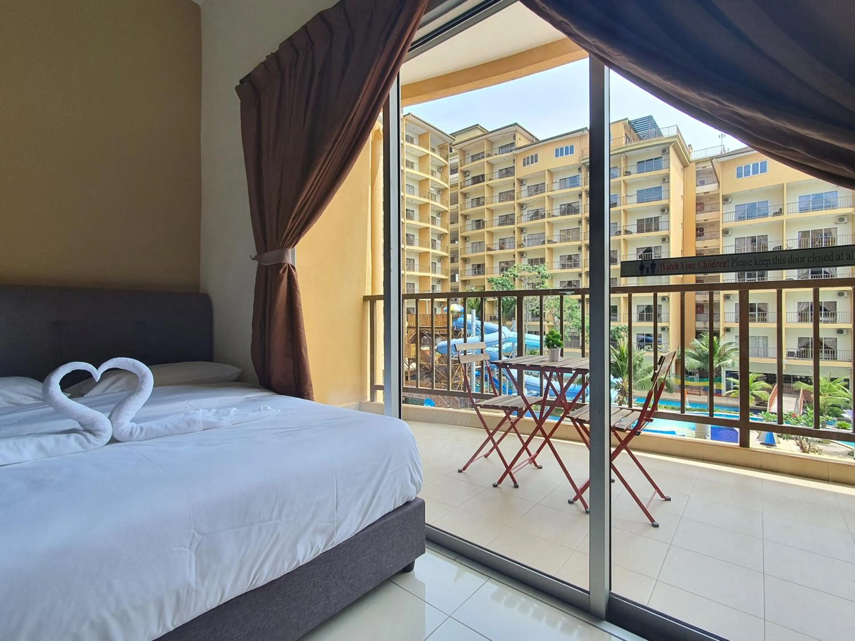 Balcony/Terrace, Bed in Gold Coast Morib Themepark View Studio