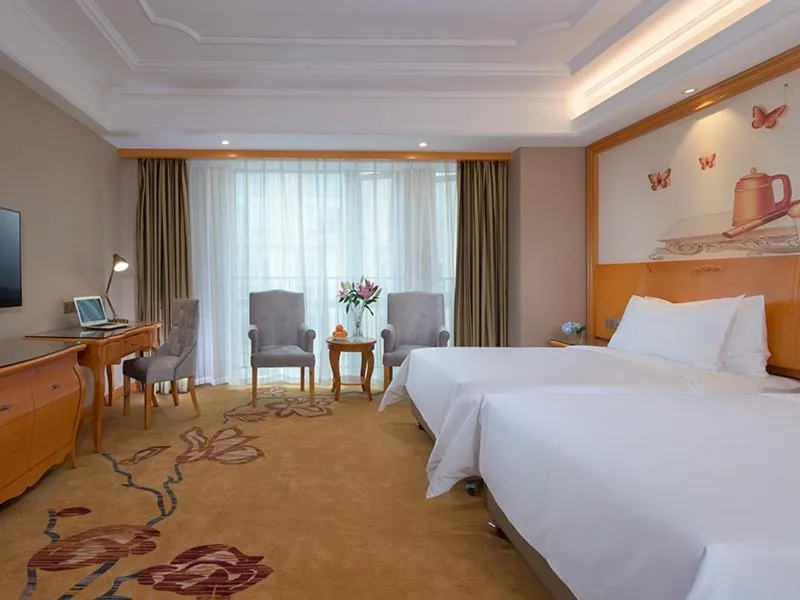 Bed in Vienna International Hotel (Fangchenggang Administration Center High-speed Railway Station branch)