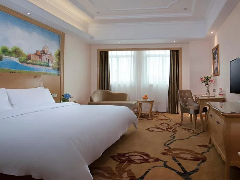 Bed in Vienna International Hotel (Fangchenggang Administration Center High-speed Railway Station branch)