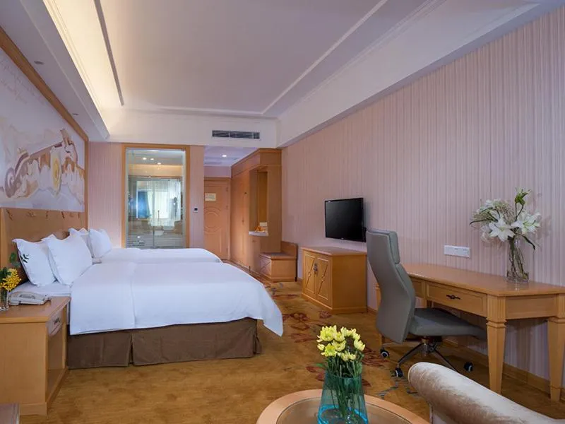 Bed in Vienna Hotel Guangzhou Conghua Jiangpu East Huanshi Road
