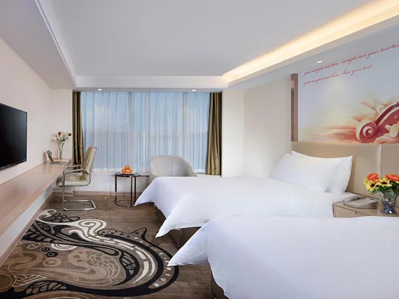 Bed in Vienna Hotel (East Plaza of WuHan High-Speed Railway Station)