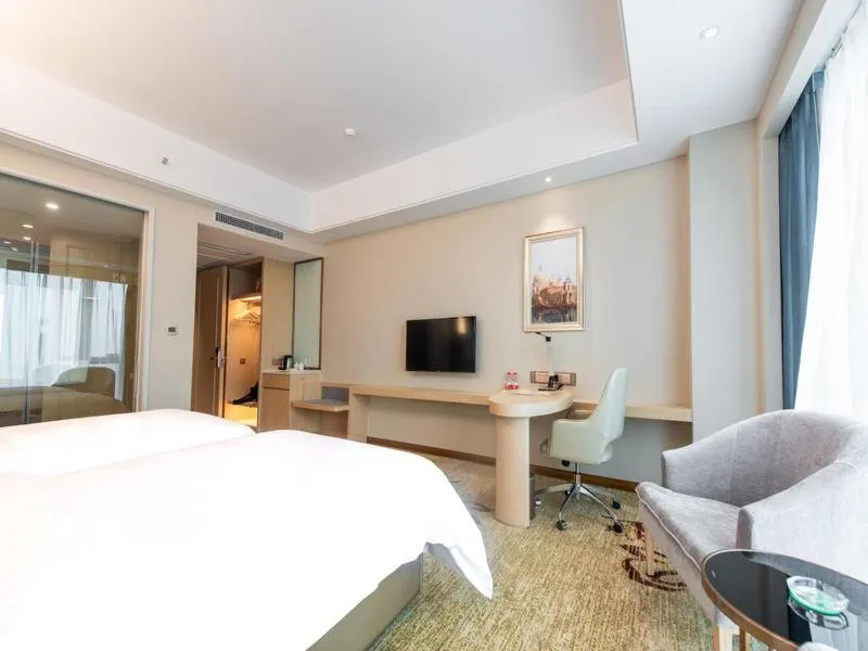 Bed in Vienna International Hotel (Changsha Ningxiang South Bus Station)