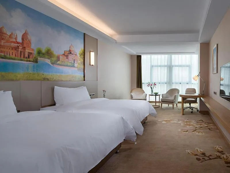 Bed in Vienna International Hotel(Jinjiang Jordan Center)