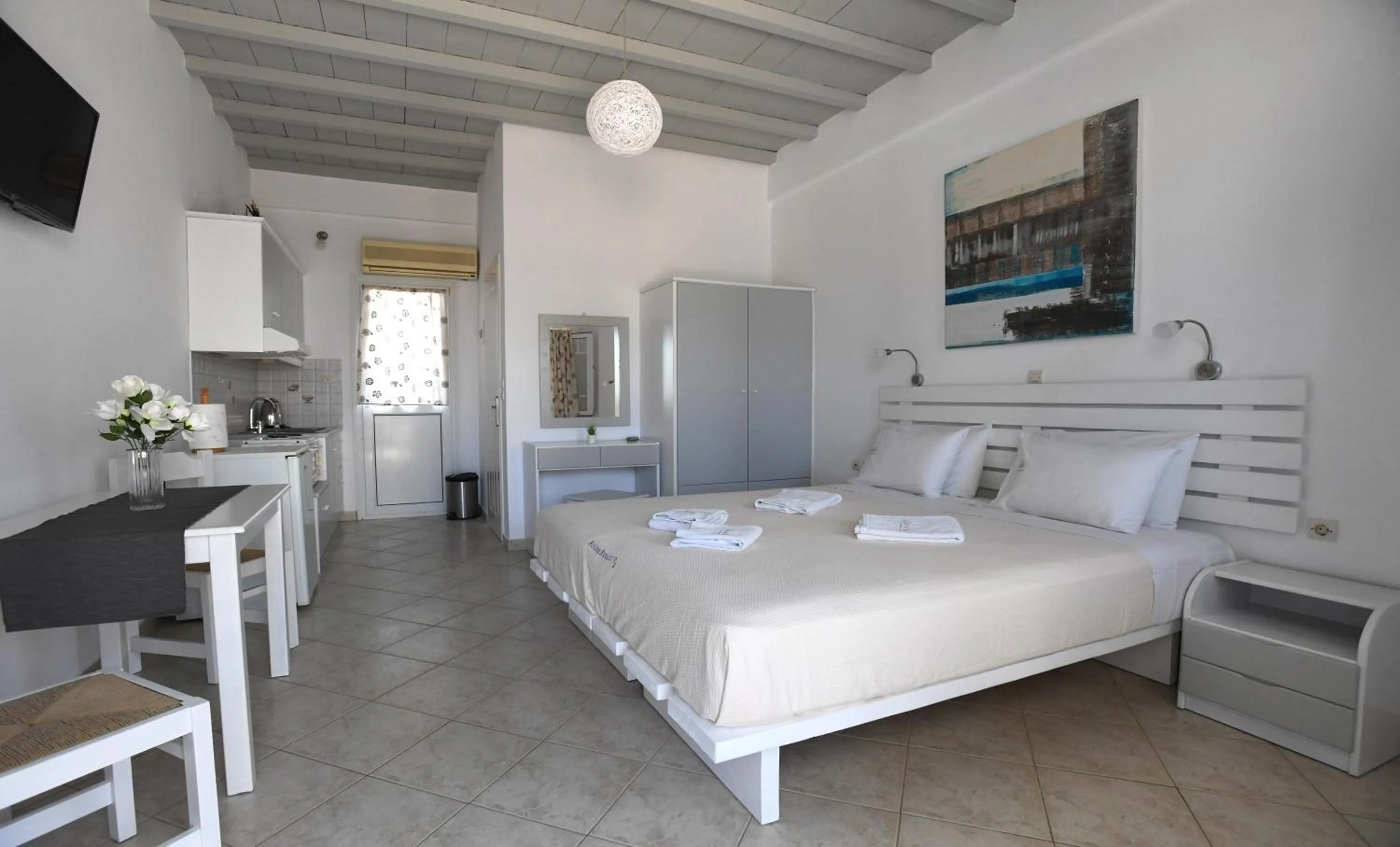 Bed in Nostos Beachfront Apartments & Studios