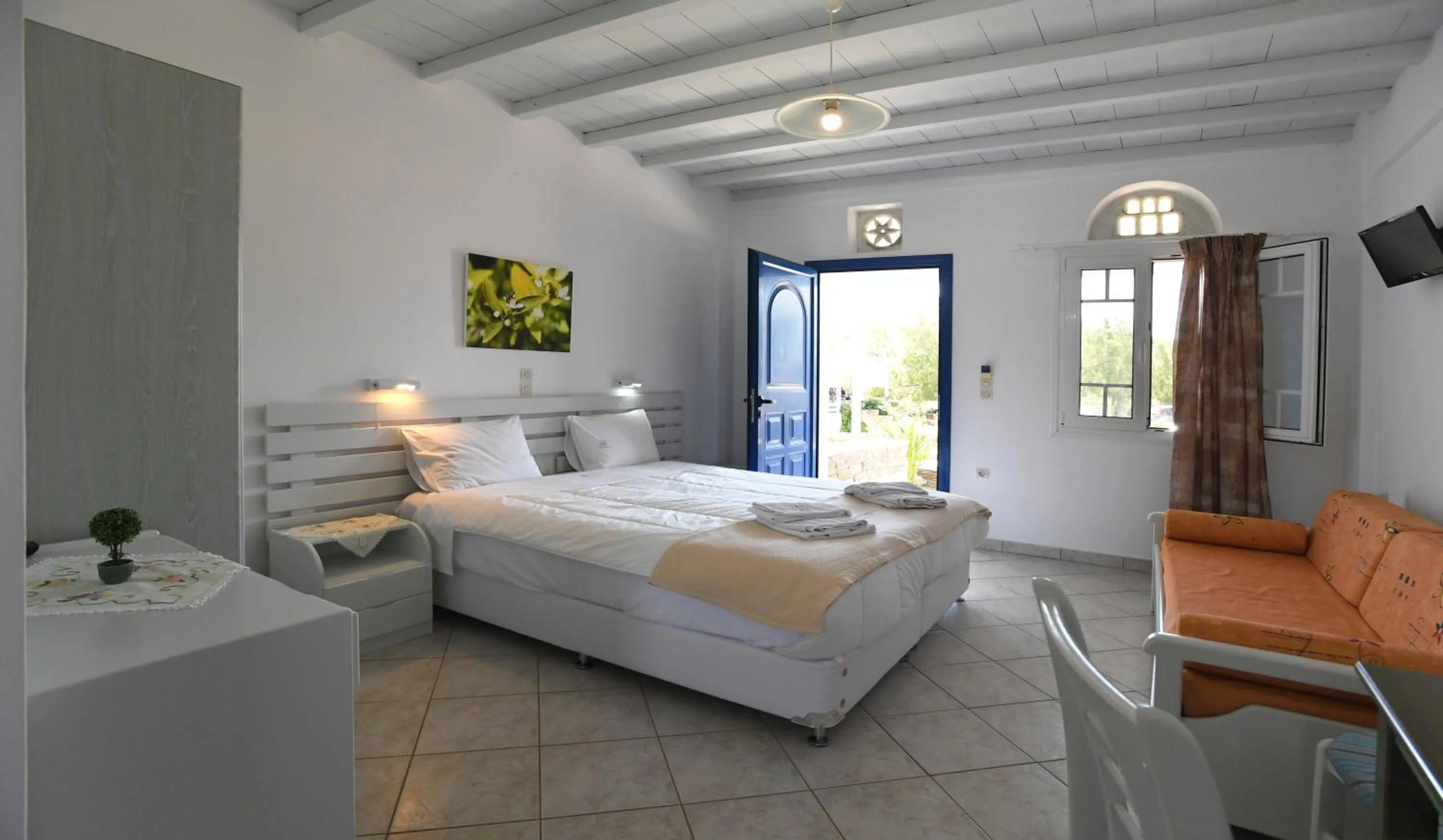 Bed in Nostos Beachfront Apartments & Studios