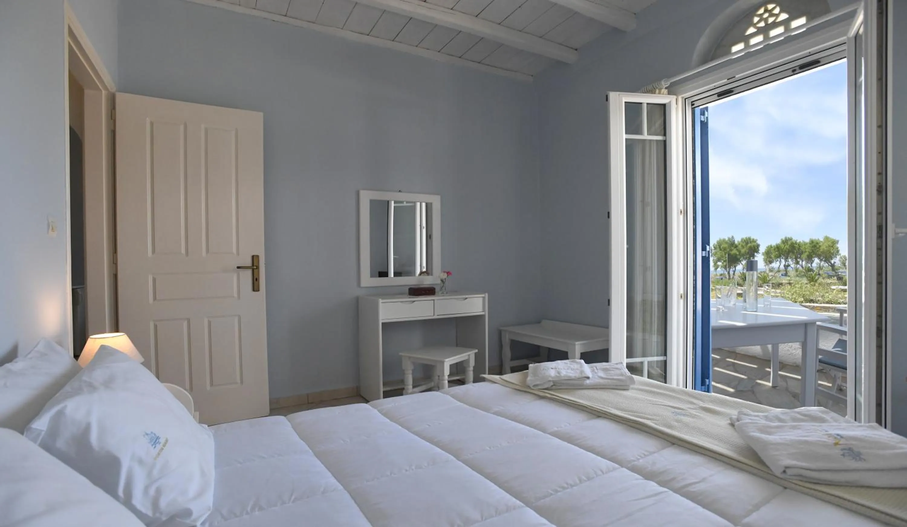 Bed in Nostos Beachfront Apartments & Studios
