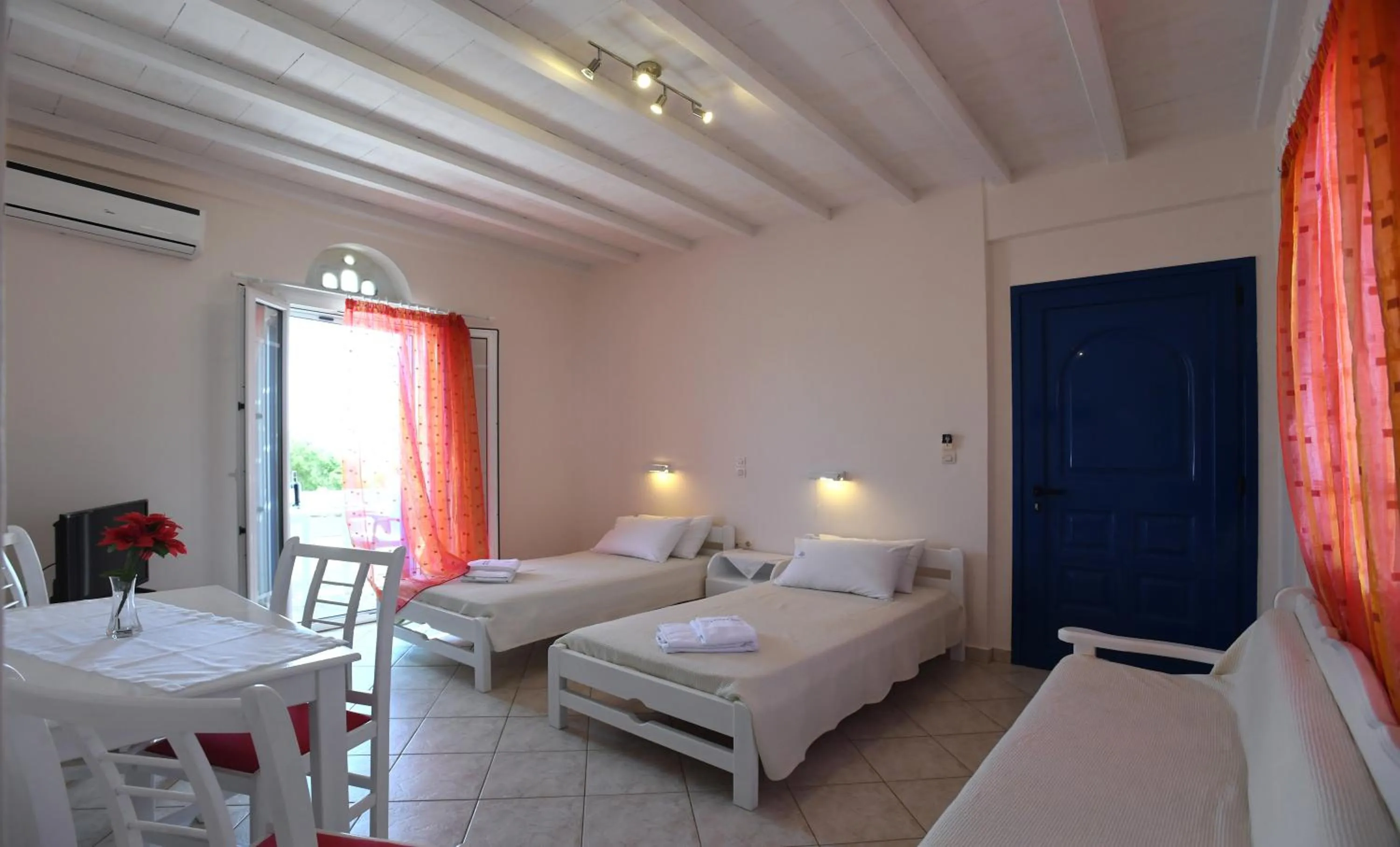 Bed in Nostos Beachfront Apartments & Studios