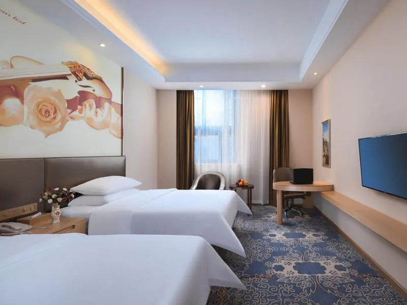 Bed in Vienna Hotel (Shanghai jinshanwei Railway Station City Beach Shop)