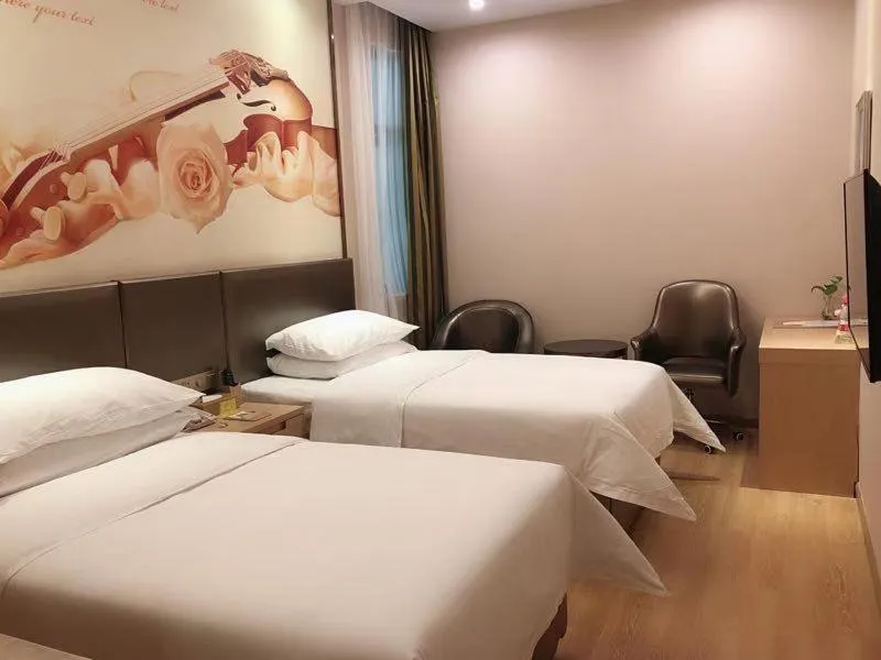 Bed in Vienna Hotel (Shanghai jinshanwei Railway Station City Beach Shop)