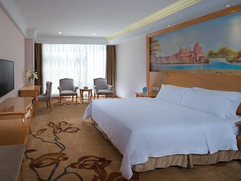 Bed in Vienna International Hotel Maoming Wanda Plaza