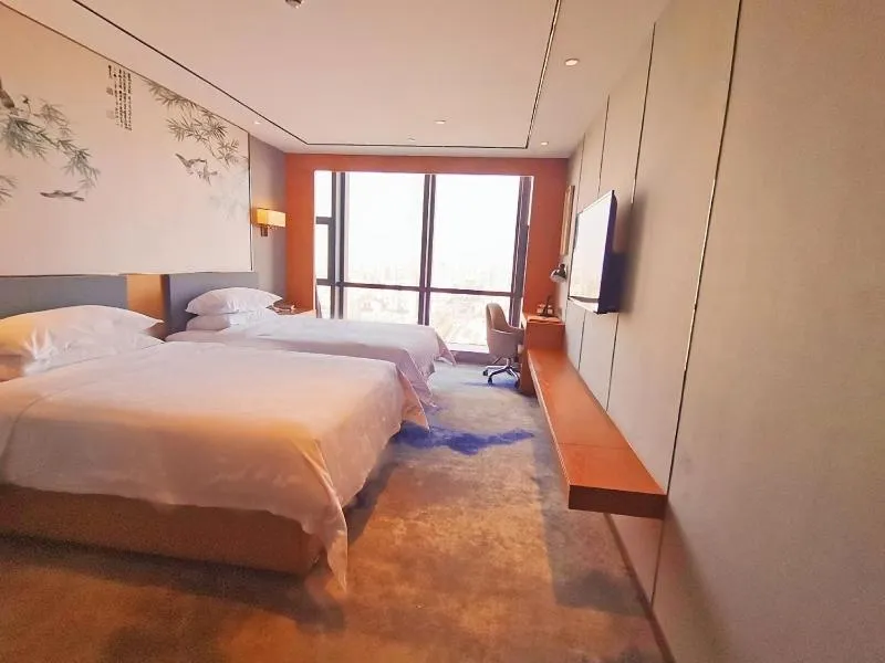 Bed in Venus Royal Hotel(Foshan Kuiqi Road Metro Station)