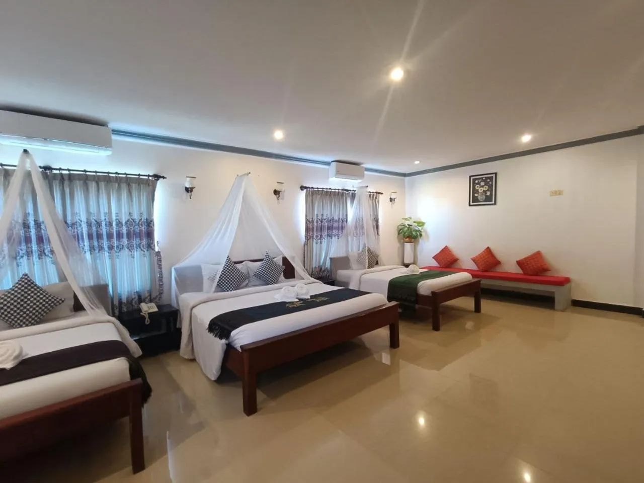 Bed in Parent Heritage Angkor Villa