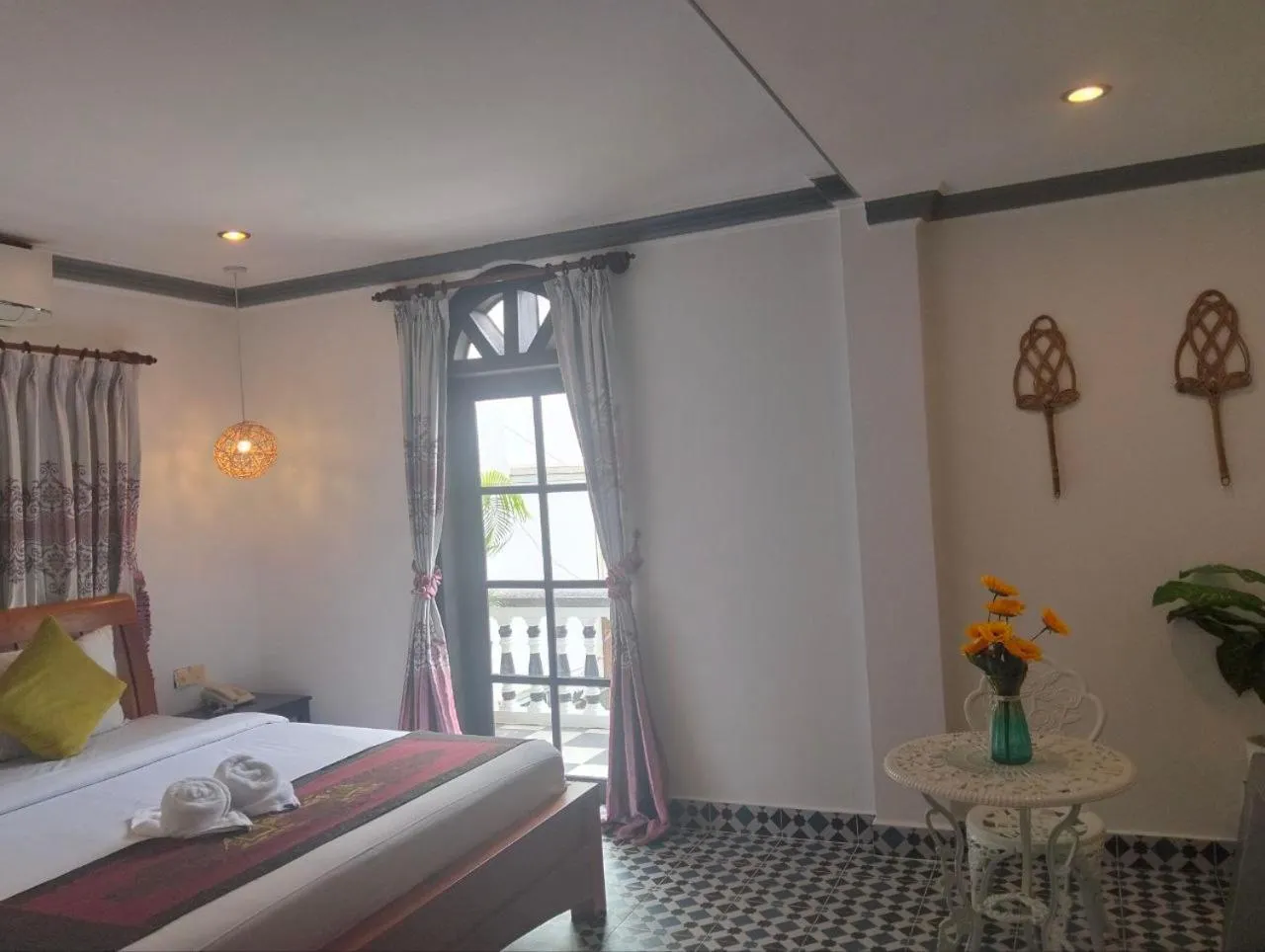 Bed in Parent Heritage Angkor Villa