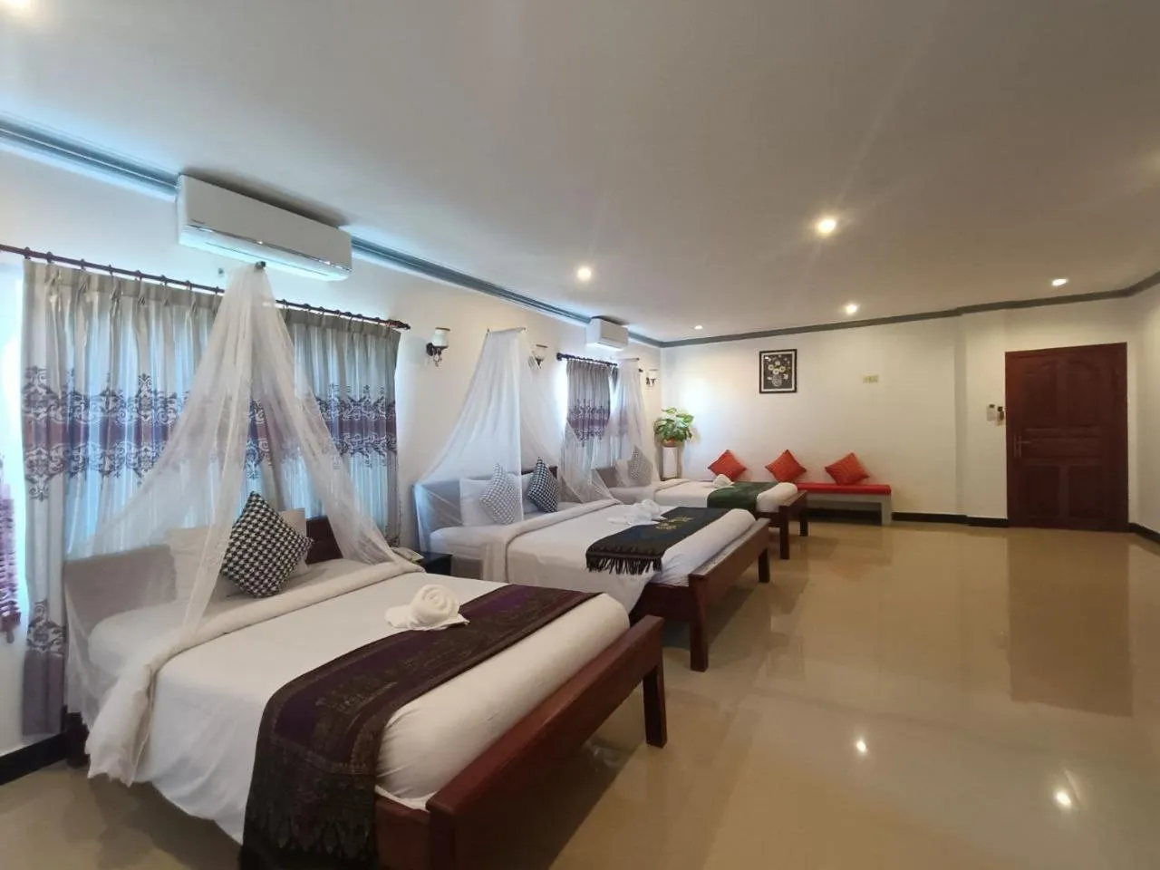 Bed in Parent Heritage Angkor Villa