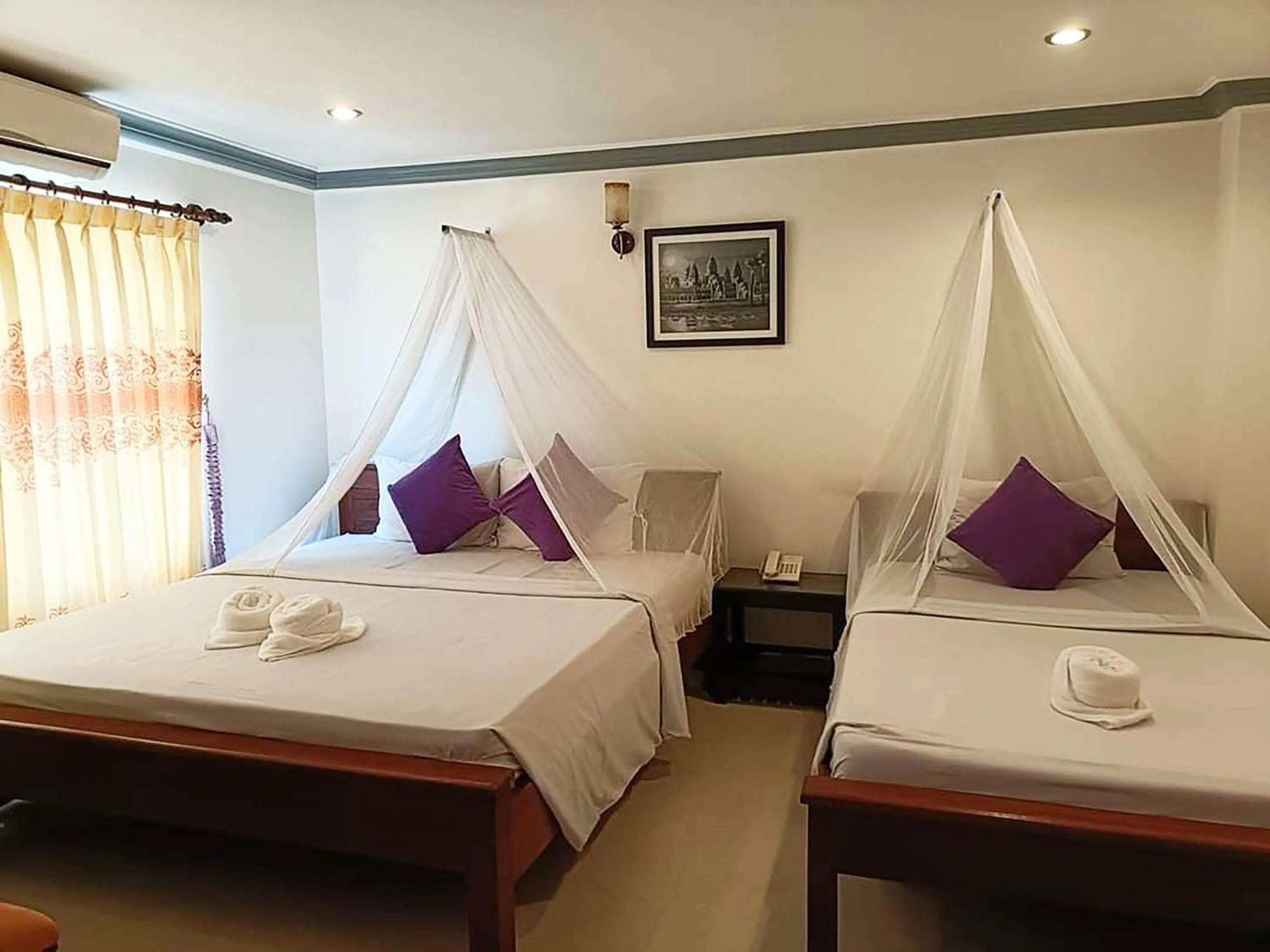 Bedroom, Bed in Parent Heritage Angkor Villa