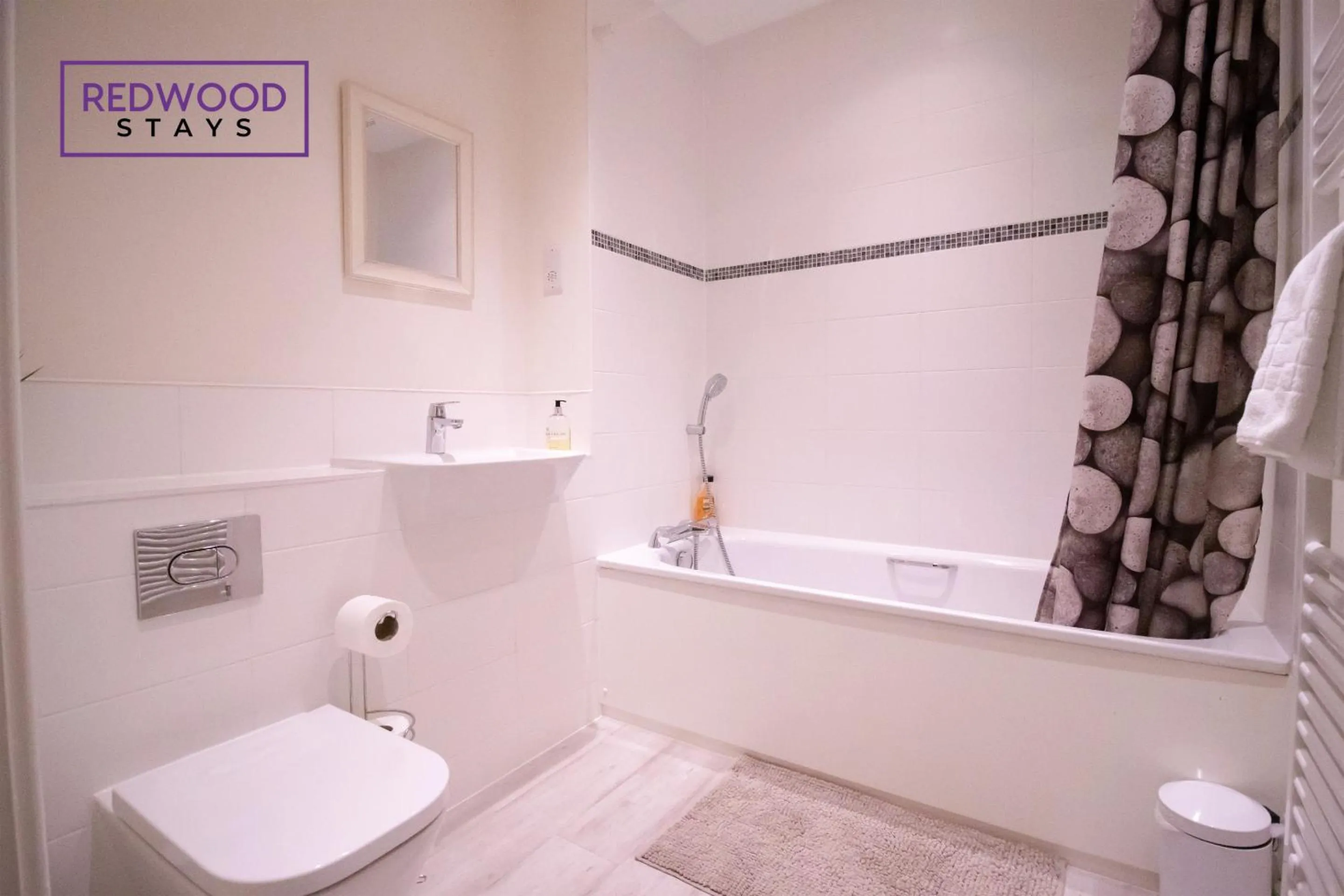 Bathroom in Festival Place, Modern Town Center Apartment, Perfect for Contractors & Families, FREE Parking & WiFi by REDWOOD STAYS