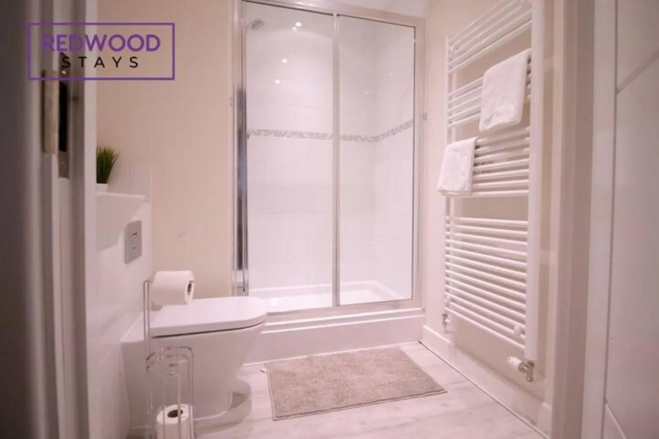 Bathroom in Festival Place, Modern Town Center Apartment, Perfect for Contractors & Families, FREE Parking & WiFi by REDWOOD STAYS