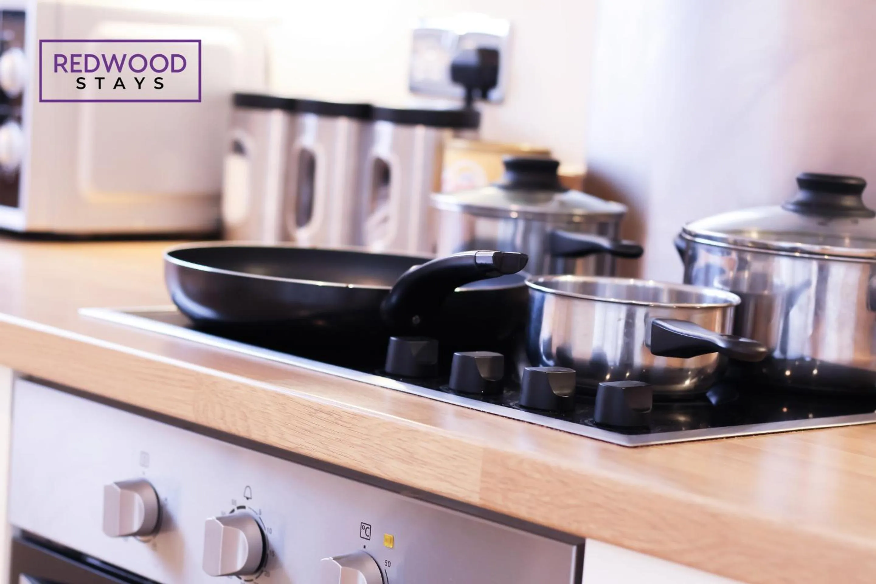 Kitchen or kitchenette in Festival Place, Modern Town Center Apartment, Perfect for Contractors & Families, FREE Parking & WiFi by REDWOOD STAYS