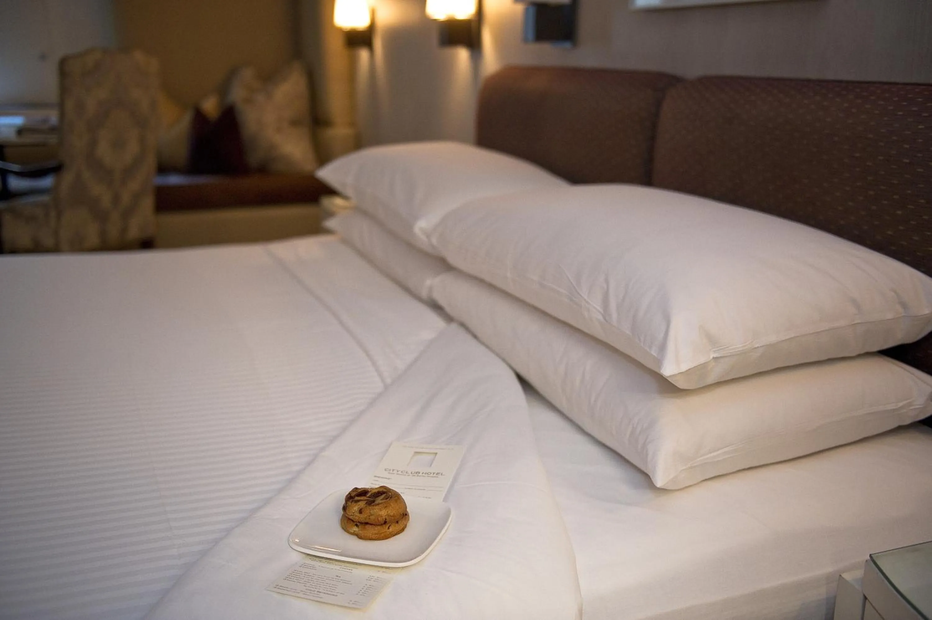 Bed in City Club Hotel