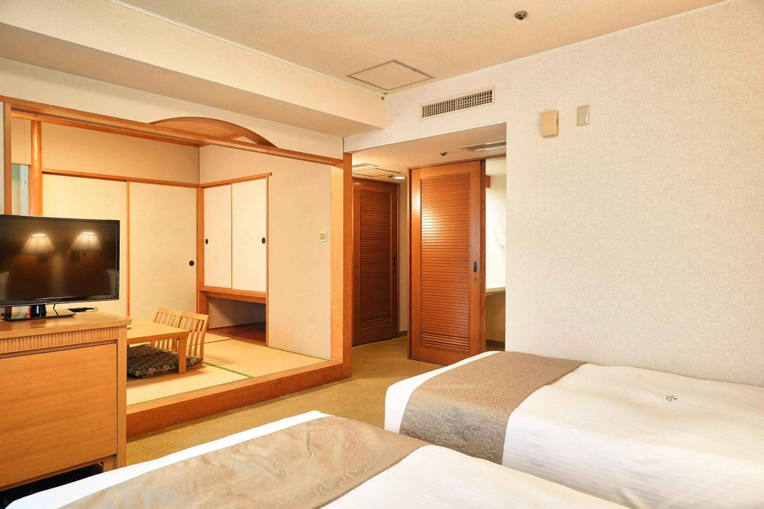 Photo of the whole room, Bed in Pacific Hotel Okinawa