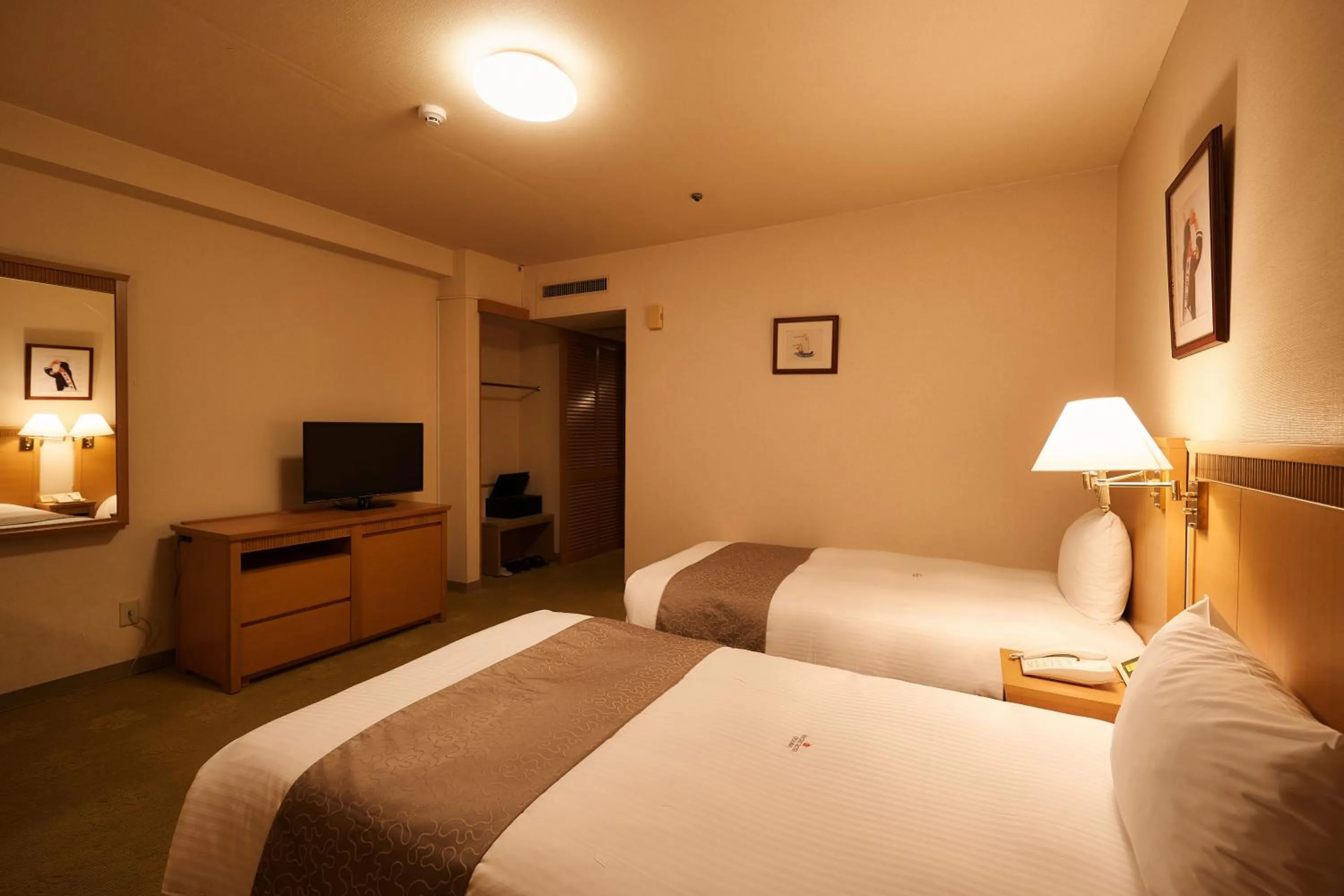 Photo of the whole room, Bed in Pacific Hotel Okinawa