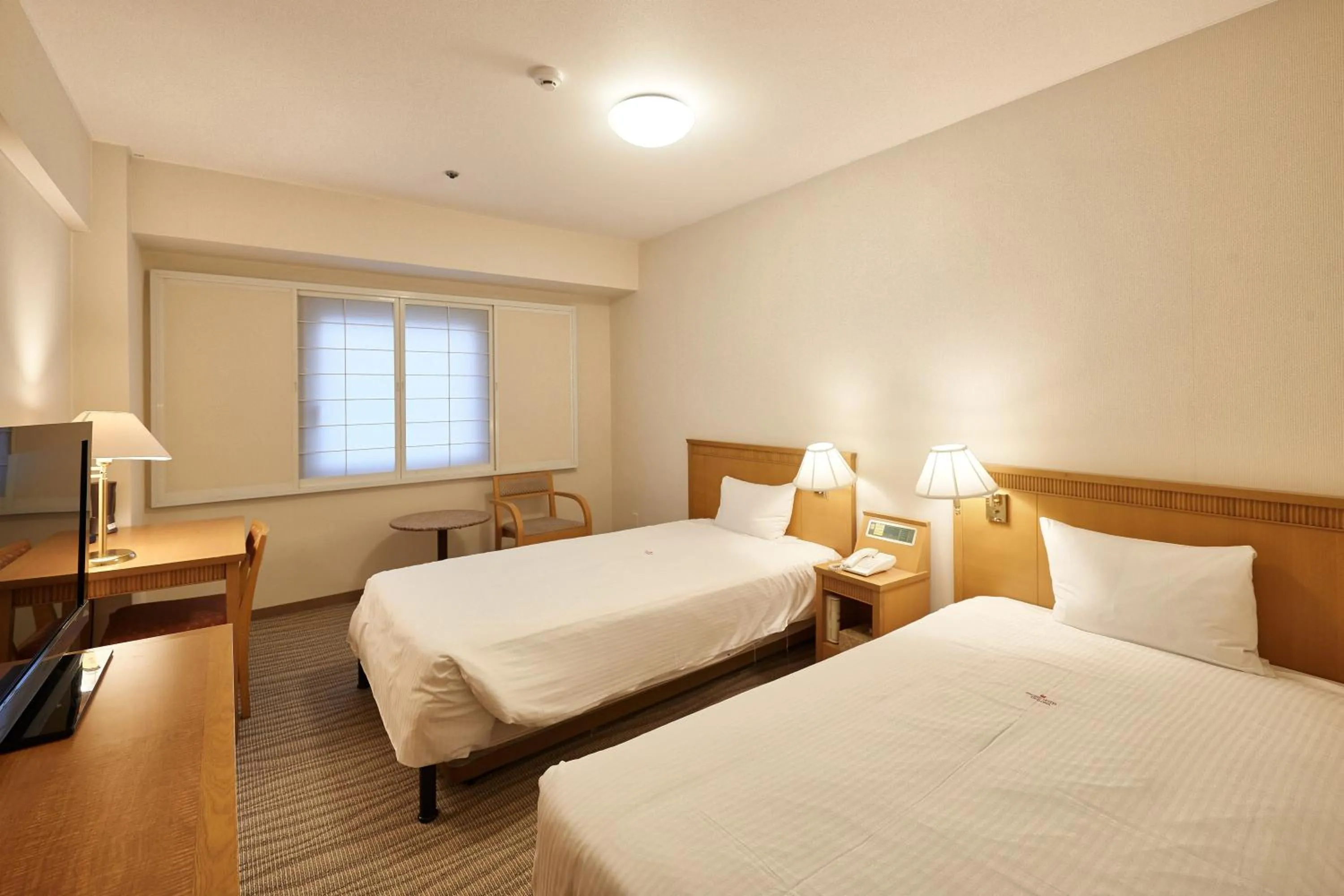 Photo of the whole room, Bed in Pacific Hotel Okinawa