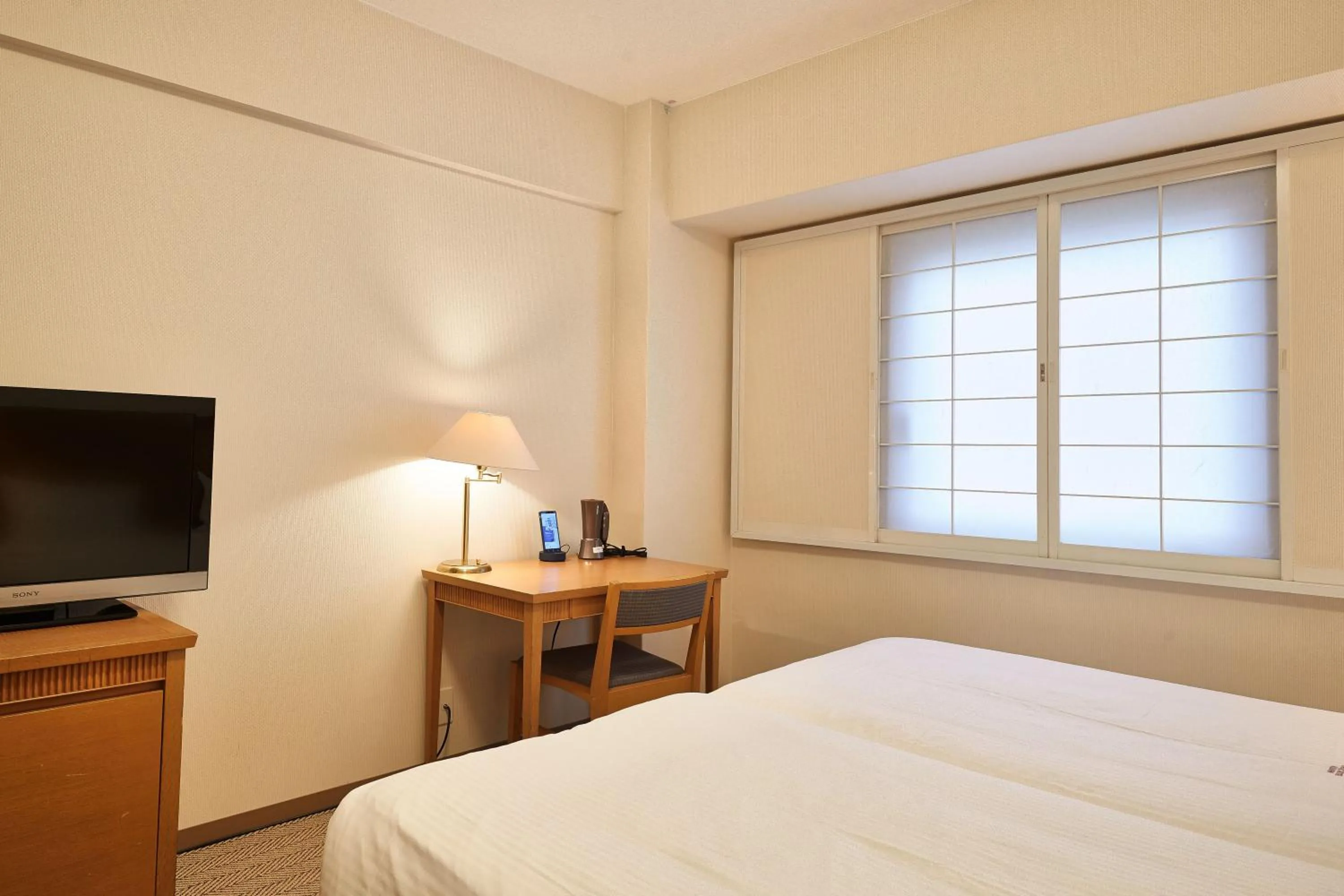 Photo of the whole room, Bed in Pacific Hotel Okinawa