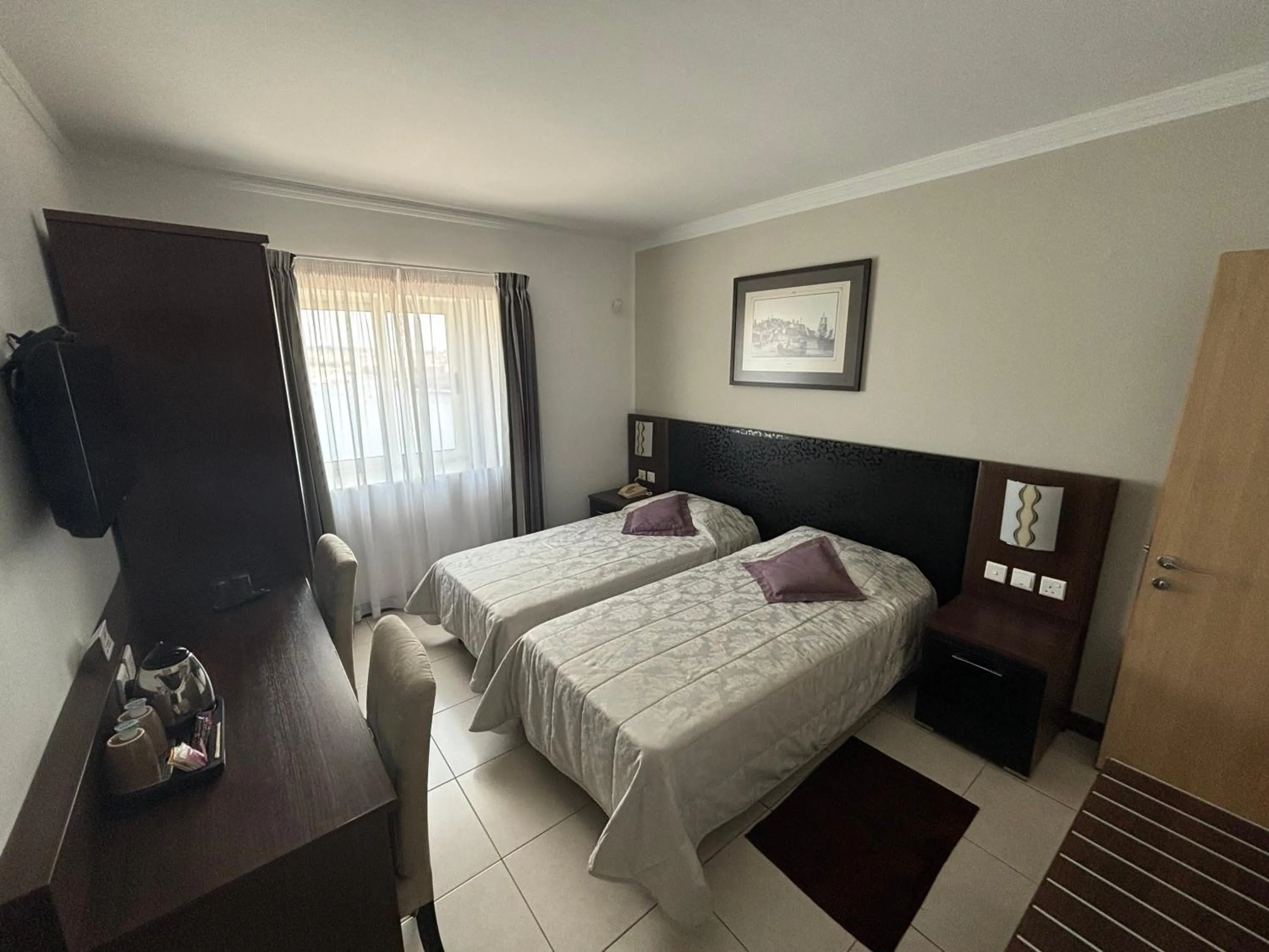 Photo of the whole room, Bed in Grand Harbour Hotel