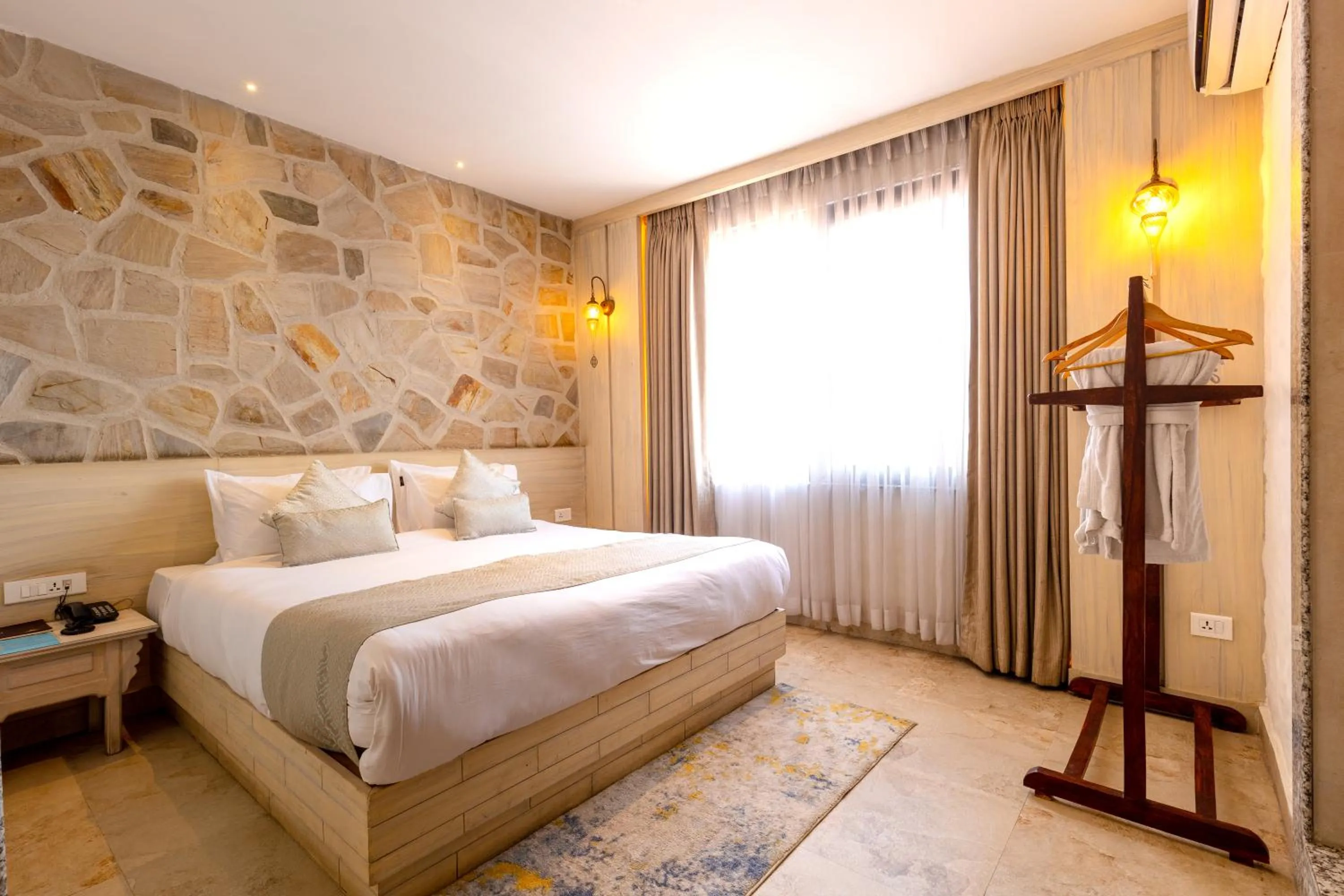 Bed in Arushi Boutique Hotel