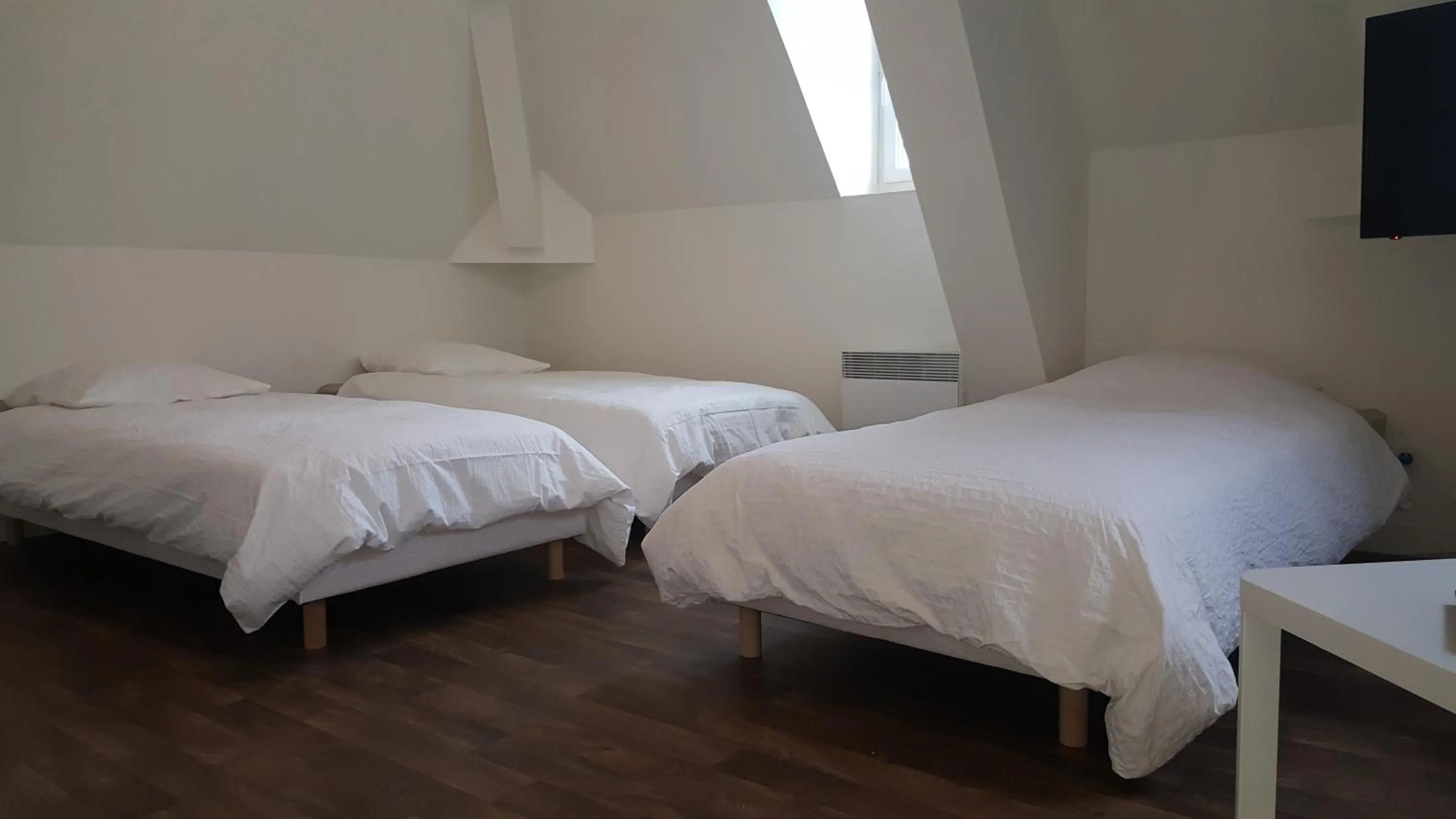 Bed in Au Pigeon Blanc