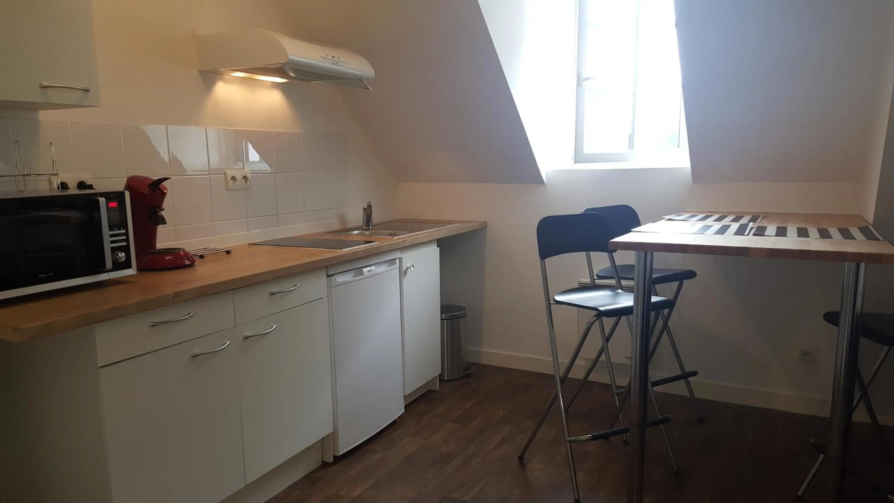 Kitchen or kitchenette in Au Pigeon Blanc