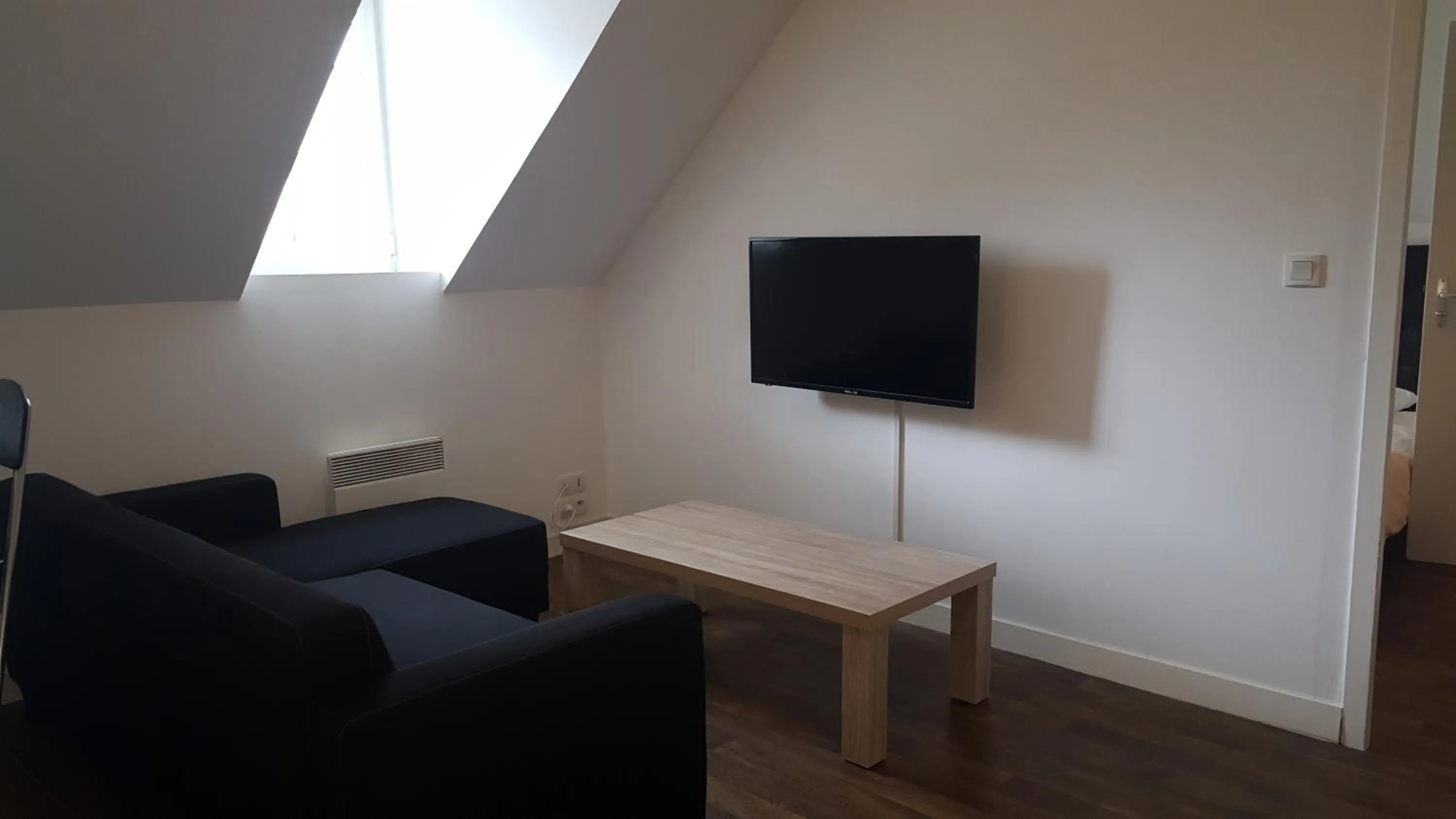 Living room in Au Pigeon Blanc